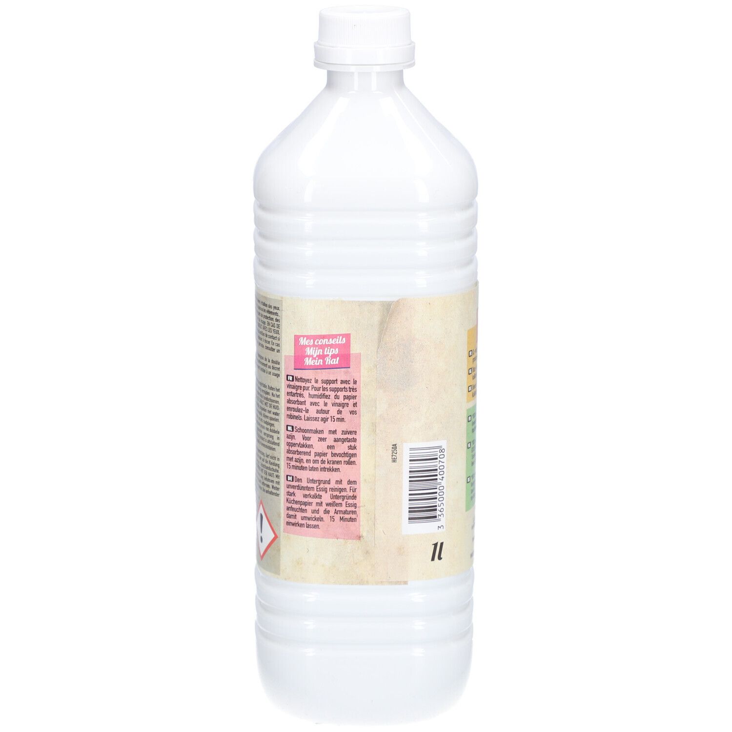 Rückseite einer weißen Flasche. Text in mehreren Sprachen. Aufkleber mit Informationen und Warnhinweisen. 1L-Angabe.