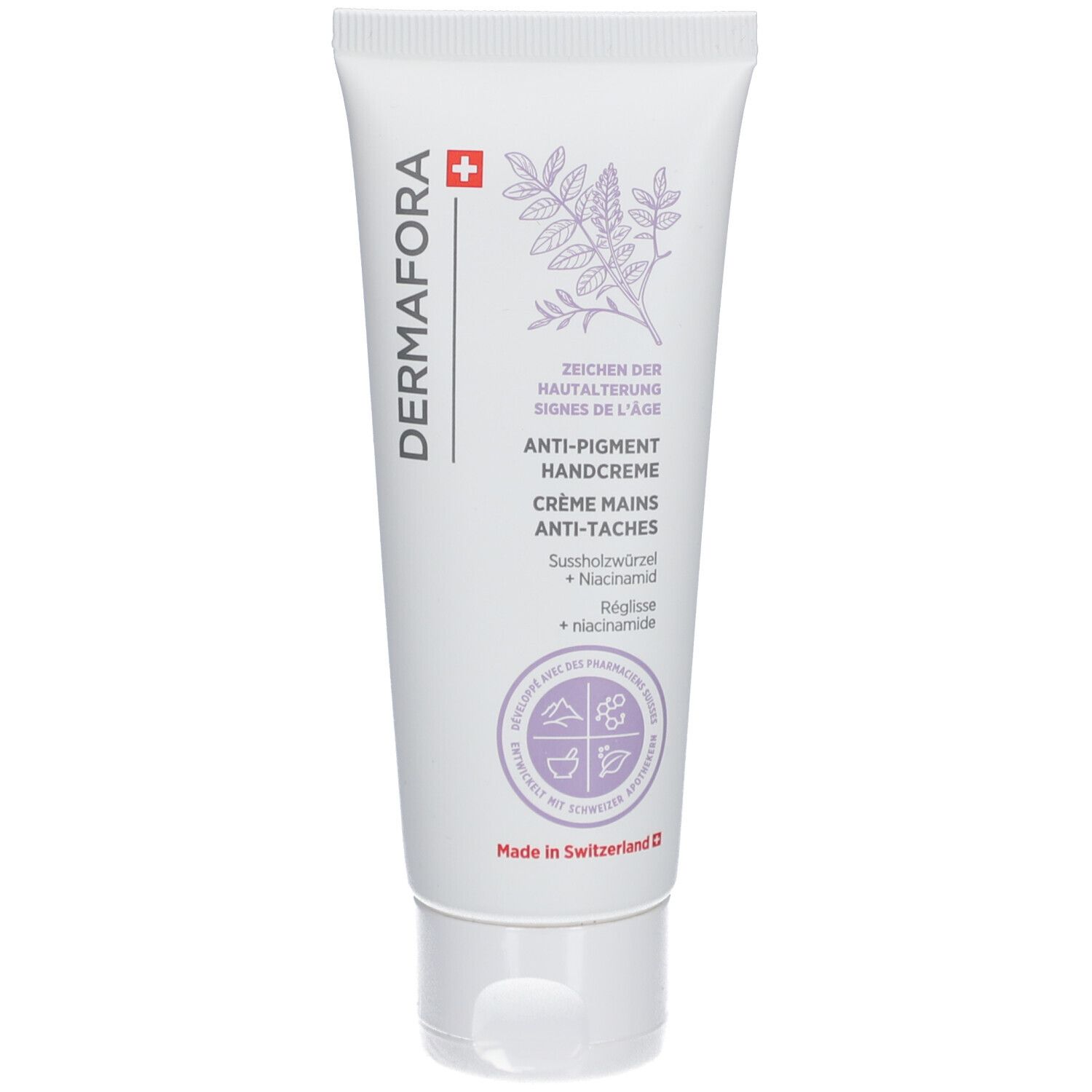 Weiße Tube mit Produktnamen und floraler Illustration. Text: Anti-Pigment Handcreme. Hergestellt in der Schweiz.