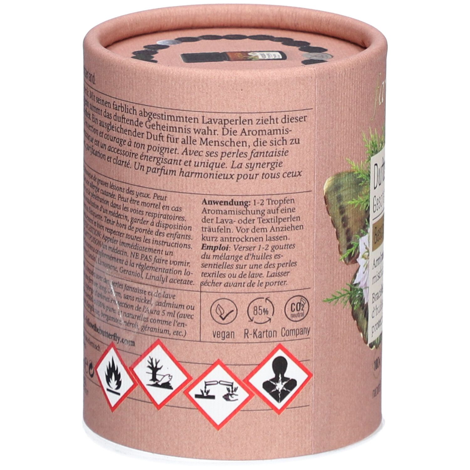 Dos de l'emballage cadeau. Texte avec instructions d'utilisation et ingrédients. Labels vegan et CO2.