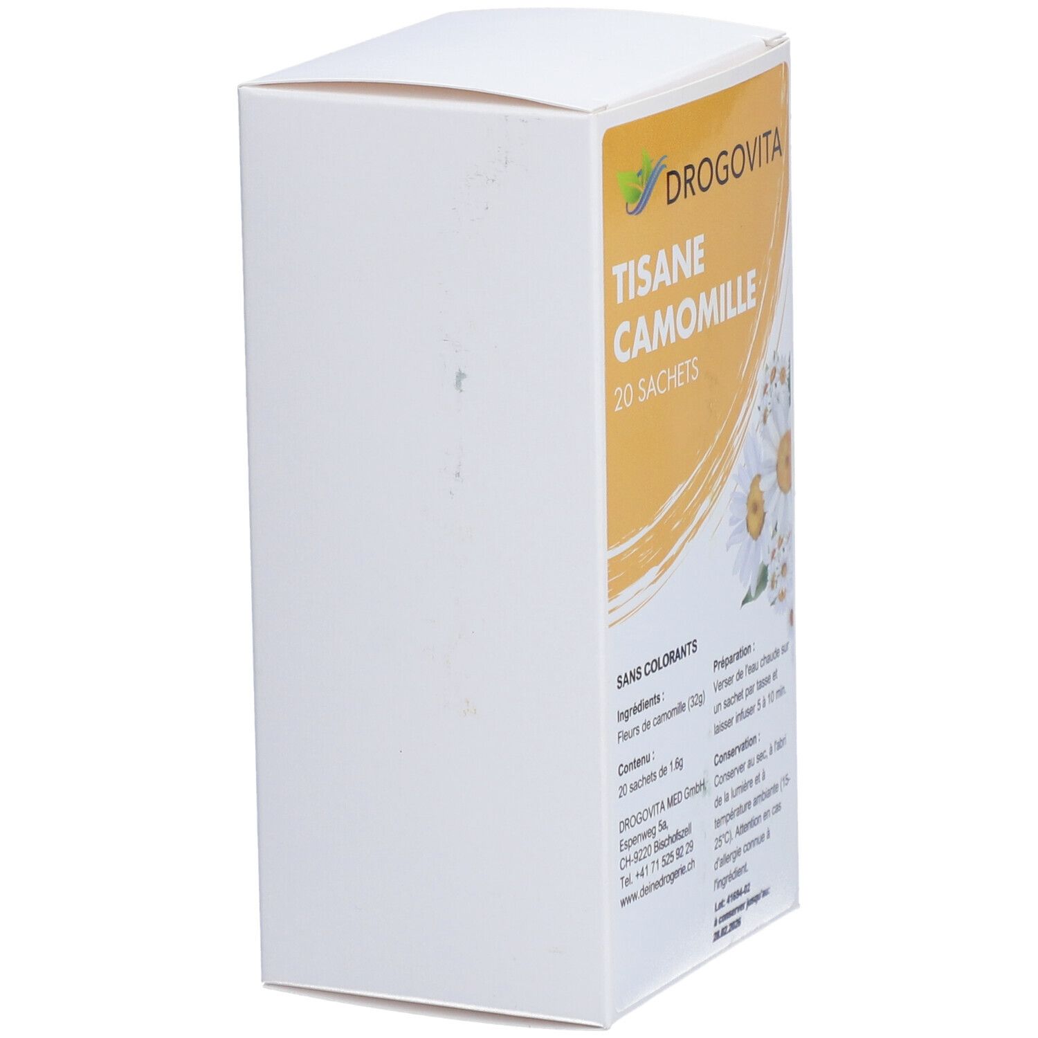 DROGOVITA Kamillen Tee Packung. Seite. Aufdruck: Tisane Camomille, 20 Sachets. Ohne Farbstoffe. Illustration: Kamillenblüten. Weiße Verpackung.