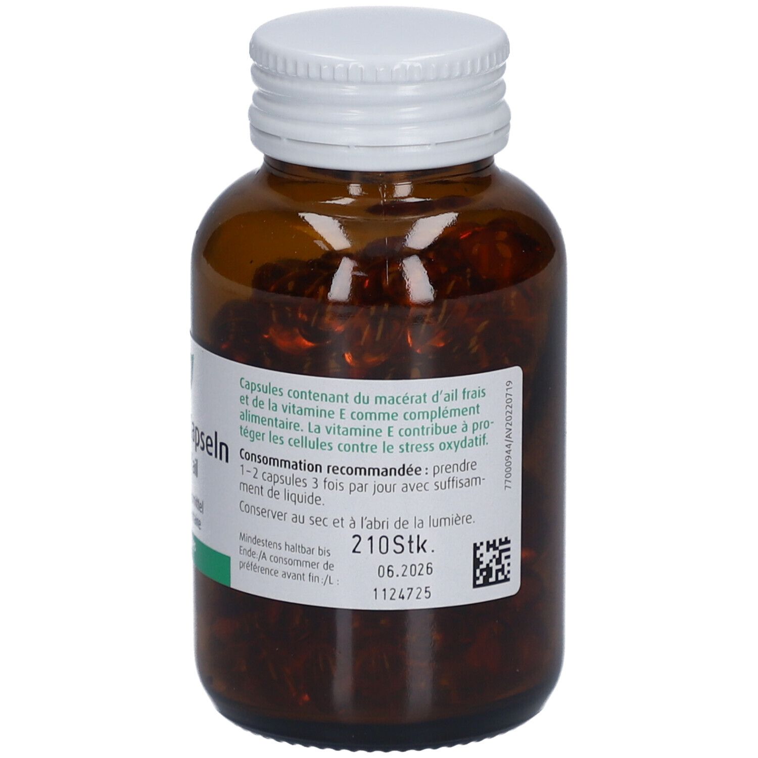 Braune Glasflasche mit weißem Deckel. Etikett mit Produktinformationen und Verfallsdatum. Kapseln sichtbar.