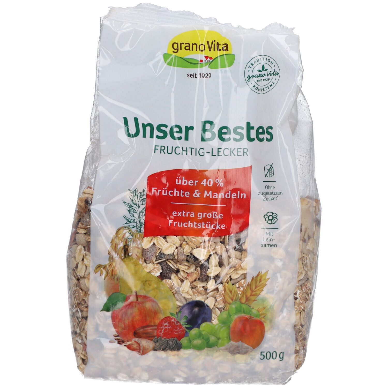 Transparente Tüte mit Müsli. Aufdruck: "granoVita Unser Bestes", Früchte & Mandeln, extra große Fruchtstücke. 500g.