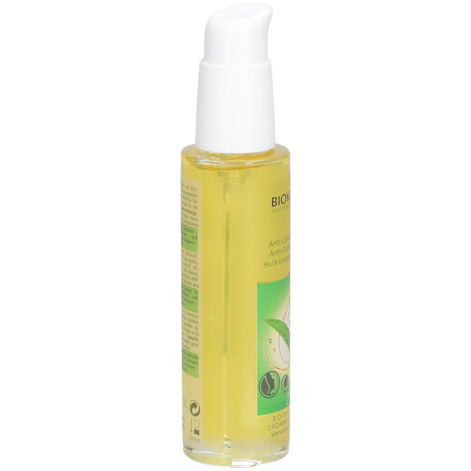 Flacon jaune avec pompe blanche. Inscription BIOKOSMA, Huile corporelle anticellulite. Étiquette verte et blanche avec feuilles.