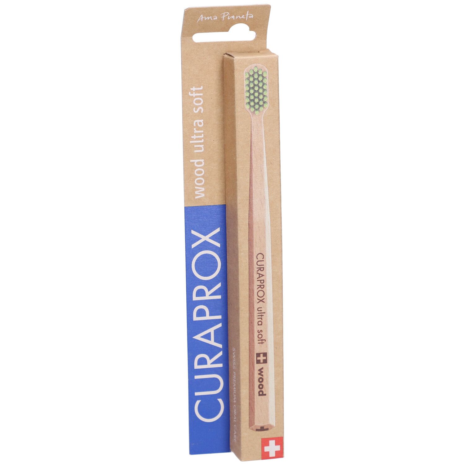 Zahnbürste in Verpackung. Holzgriff, grüner Bürstenkopf. Marke CURAPROX, Schriftzug 'wood ultra soft'. Schweizer Kreuz.