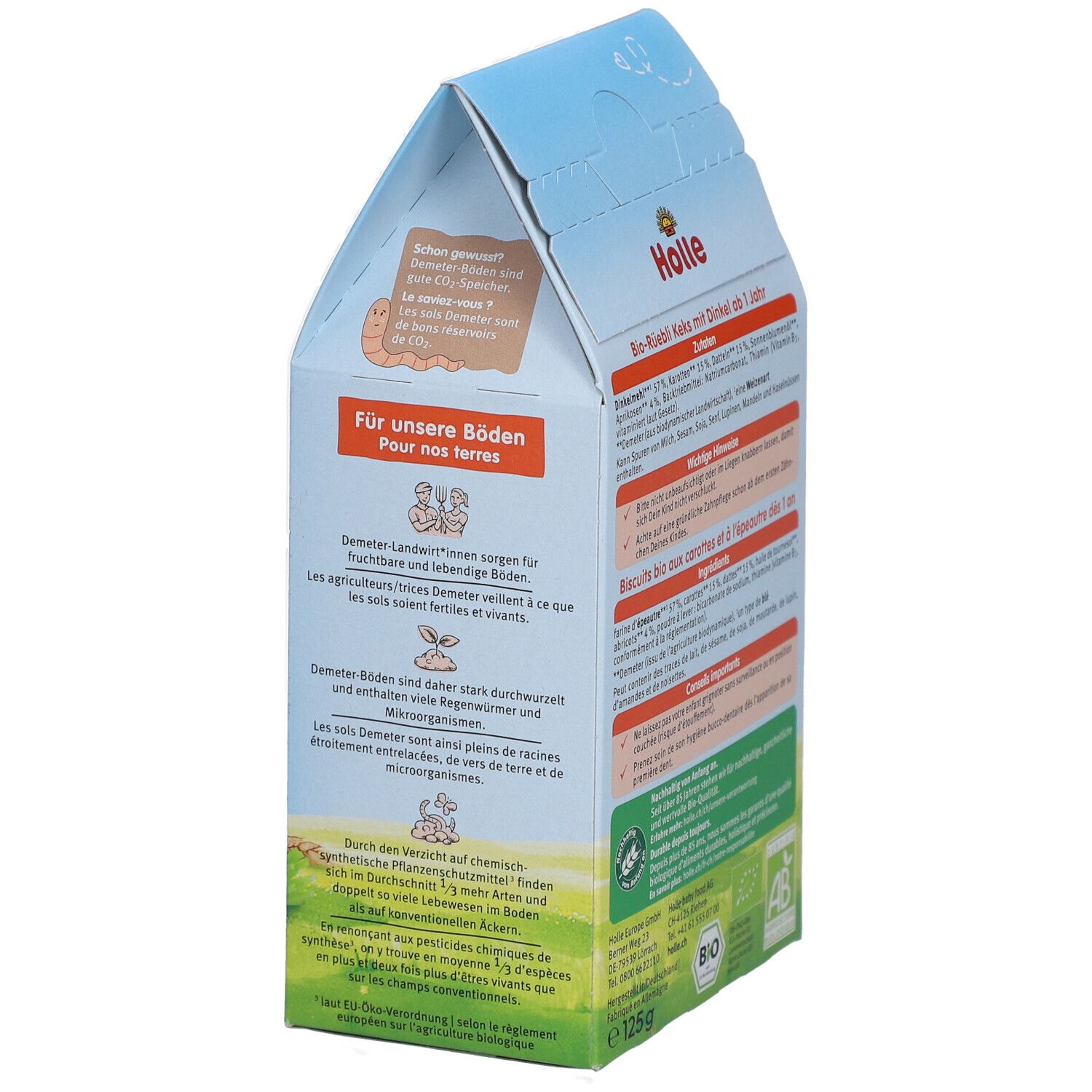 Seite der Holle Bio-Rüebli Keks Verpackung. Text über Demeter-Landwirtschaft und Bio-Siegel.