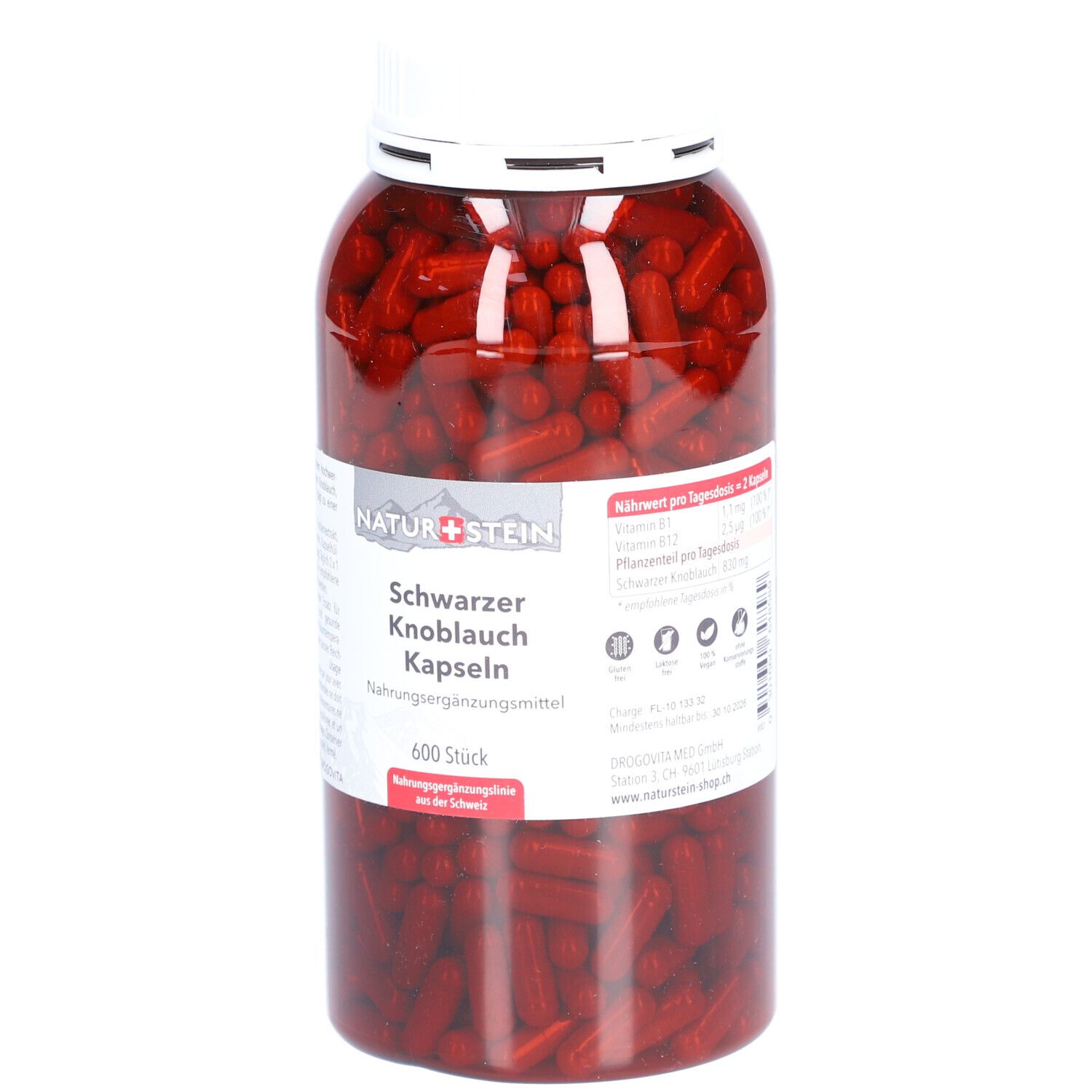 Flasche mit schwarzen Knoblauch Kapseln. Aufschrift: NATURSTEIN Schwarzer Knoblauch Kapseln. 600 Stück. Weißer Deckel.