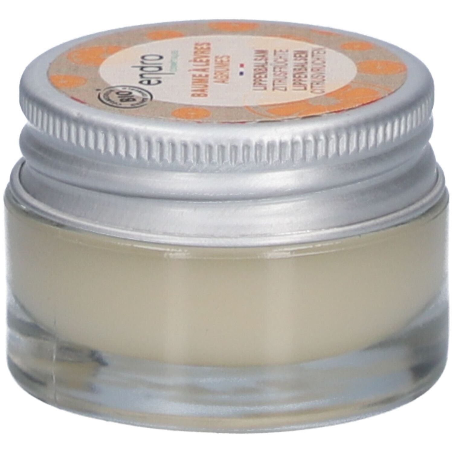 Glasbehälter mit Lippenbalsam. Deckel mit Produktbezeichnung und Bio-Siegel. Text: ENDRO, BAUME À LÈVRES, AGRUMES, LIPENBALSAM ZITRUSFRÜCHTE, CITRUSVRUCHTEN.