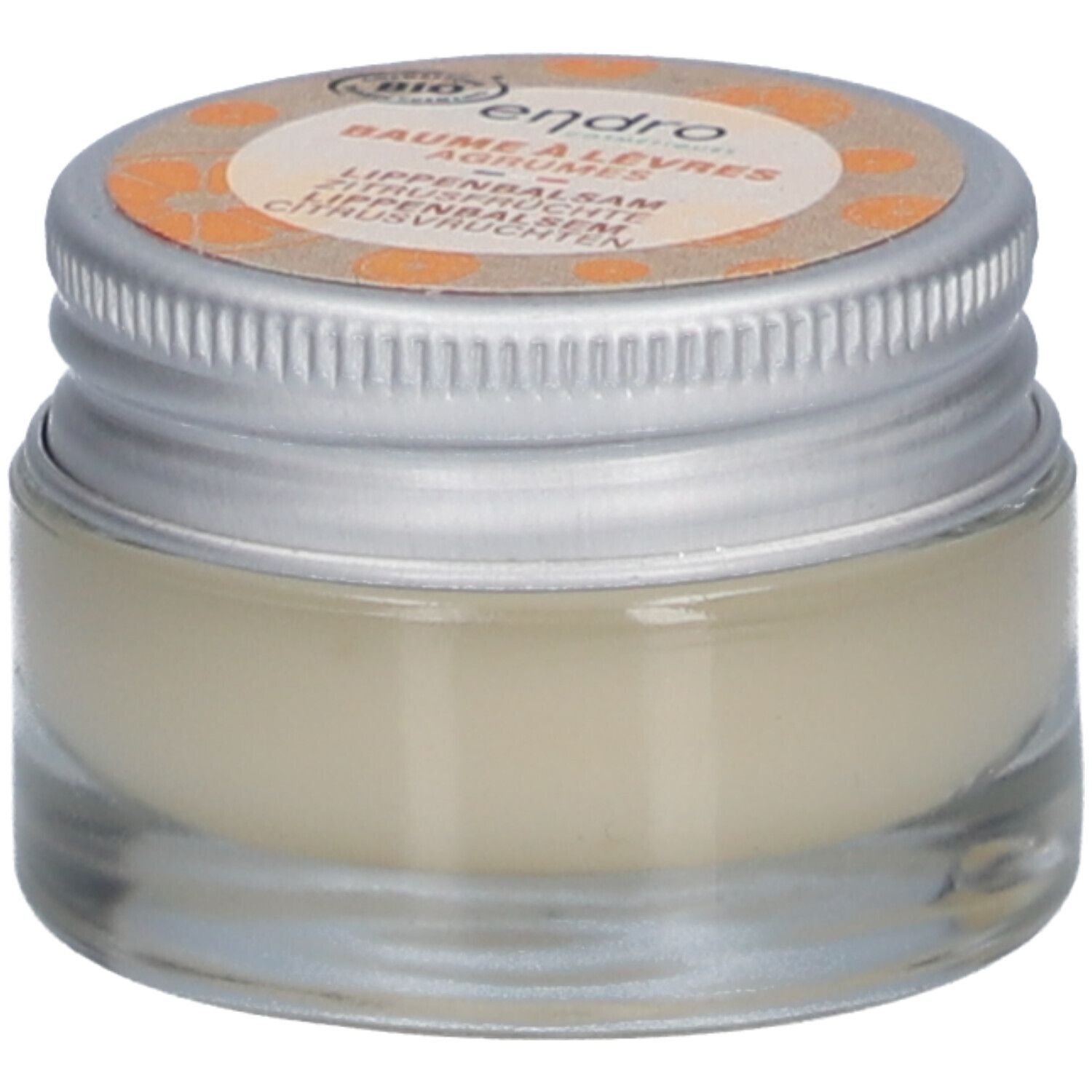 Glasbehälter mit Lippenbalsam. Deckel mit Produktbezeichnung und Bio-Siegel. Text: ENDRO, BAUME À LÈVRES, AGRUMES, LIPENBALSAM ZITRUSFRÜCHTE, CITRUSVRUCHTEN.
