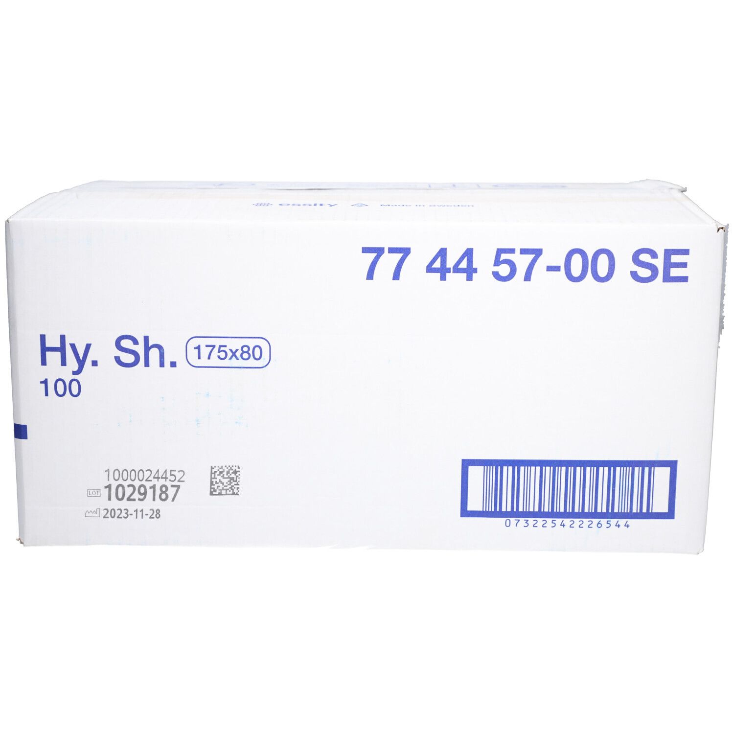 Weißer Karton mit blauer Schrift. Aufschrift: Hy. Sh. (175x80), 100. Weitere Angaben: 77 44 57-00 SE, Barcode, Chargennummer und Datum.