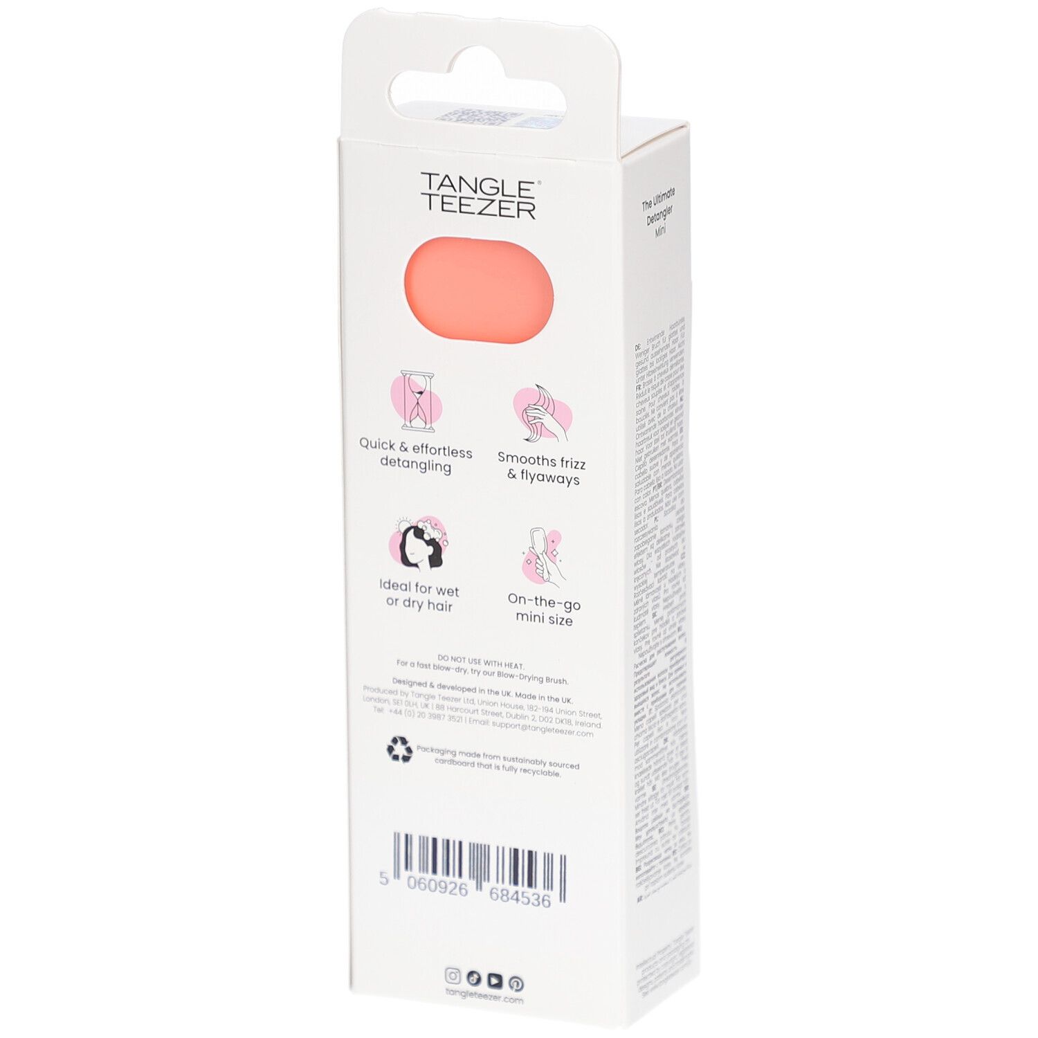 Rückseite der TANGLE TEEZER Wet Detangler Mini Verpackung. Rosa und weiß. Produktinformationen und Logos.