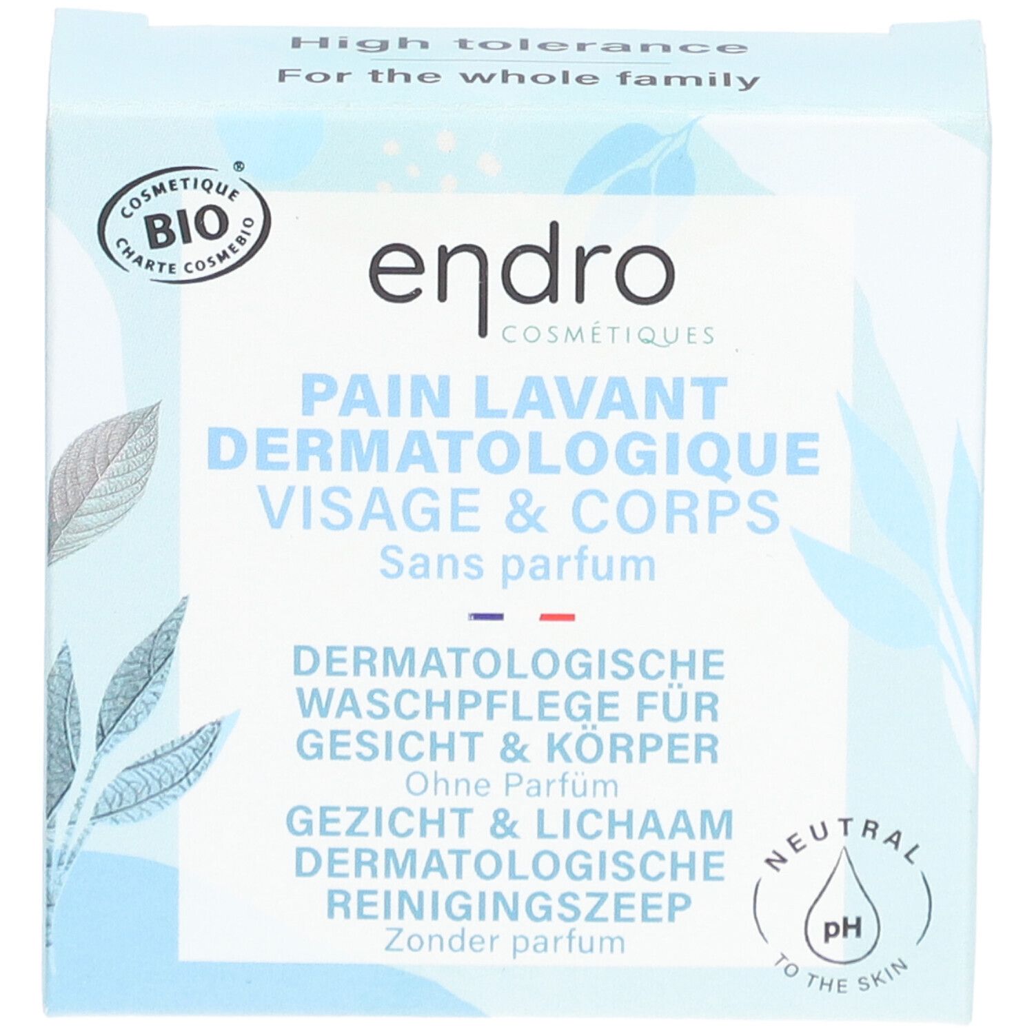 Boîte bleu clair avec nom et logo du produit. Texte: PAIN LAVANT DERMATOLOGIQUE VISAGE & CORPS. Sans parfum. Certification bio.