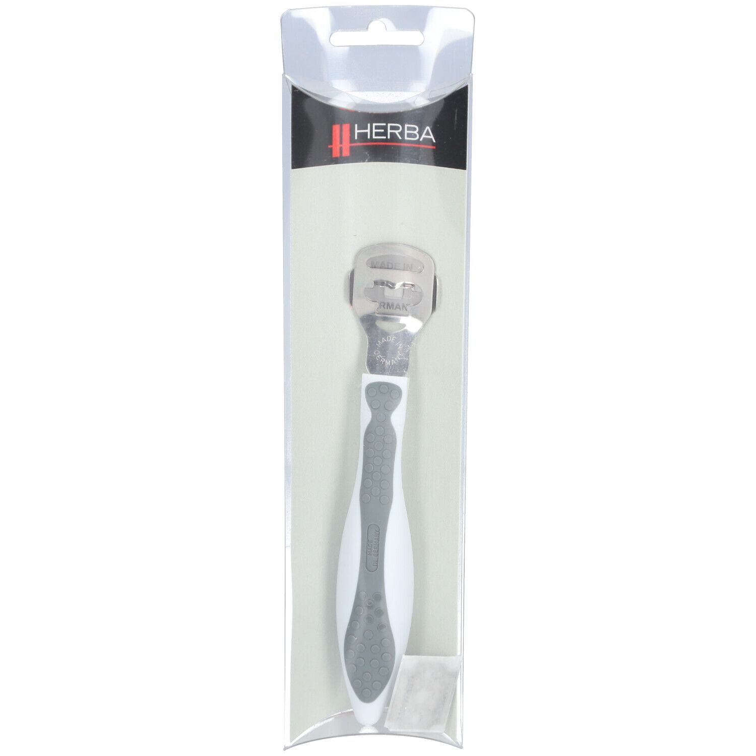 Râpe à corne, softtouch gris, dans son emballage. Manche blanc-gris, lame métallique. Logo HERBA.