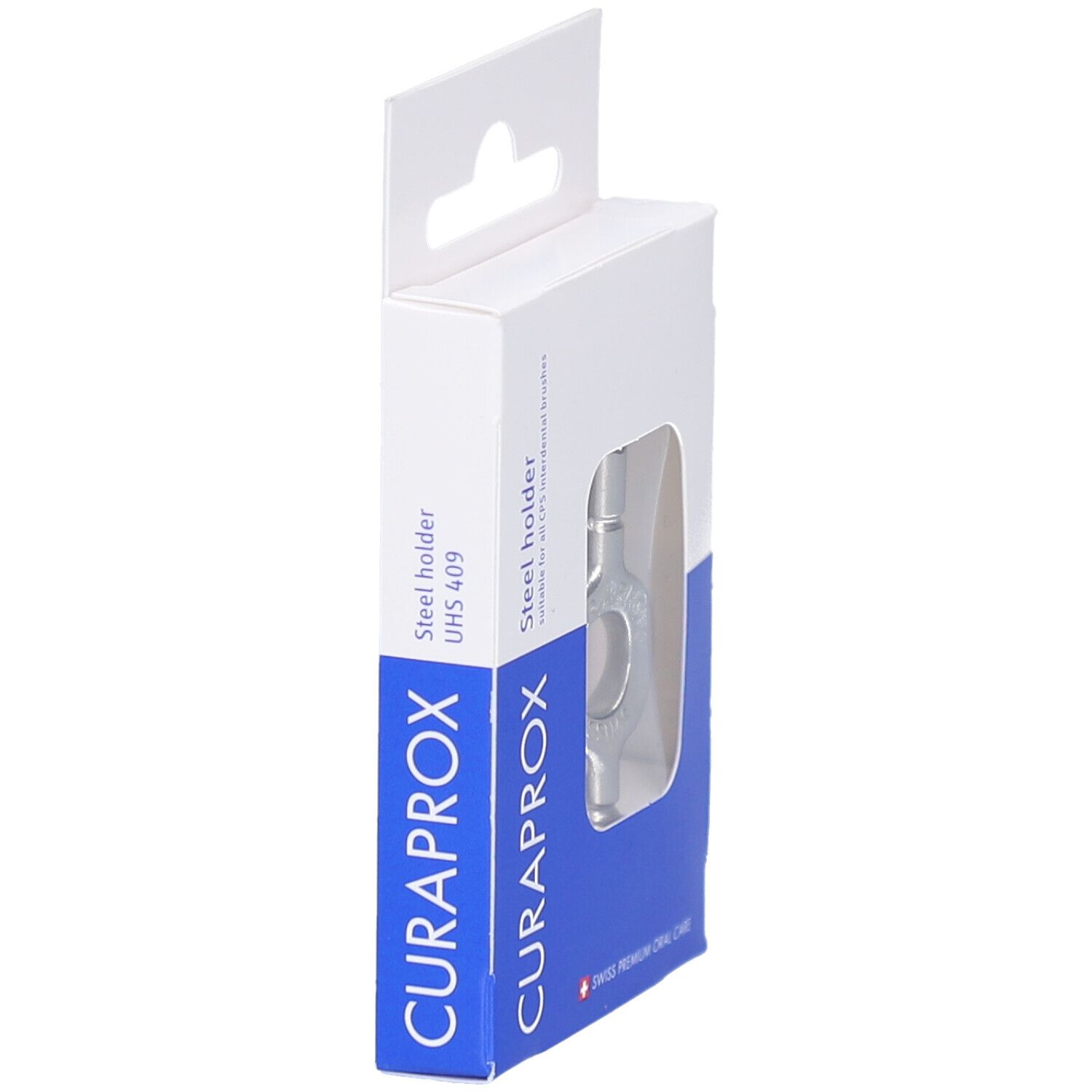 Weiße Verpackung mit Sichtfenster. Silberfarbener Stahlhalter sichtbar. Marke CURAPROX, Text: Steel holder.