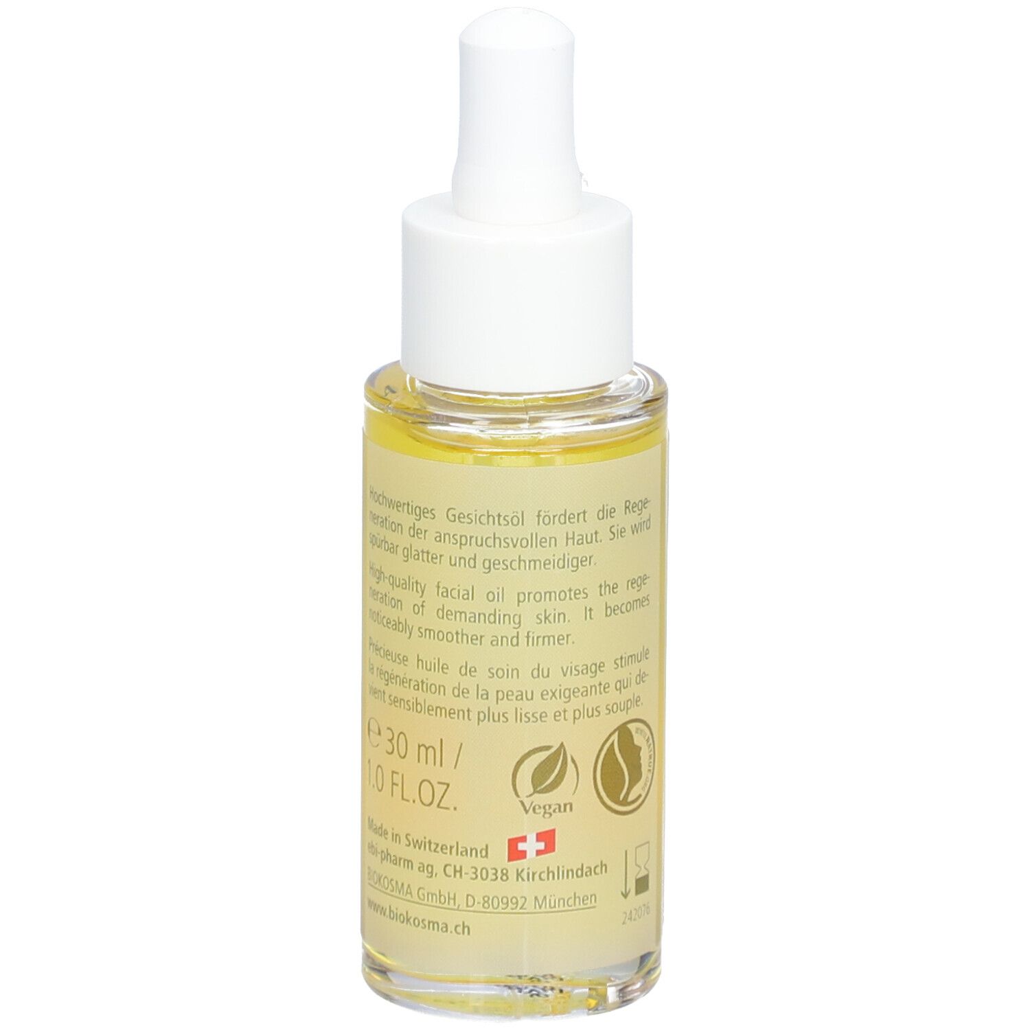 Gesichtsöl-Flasche, Rückseite. Text, Inhaltsangaben, Vegan-Siegel. Gelbe Flüssigkeit. 30 ml/1.0 FL.OZ. BIOKOSMA-Logo.
