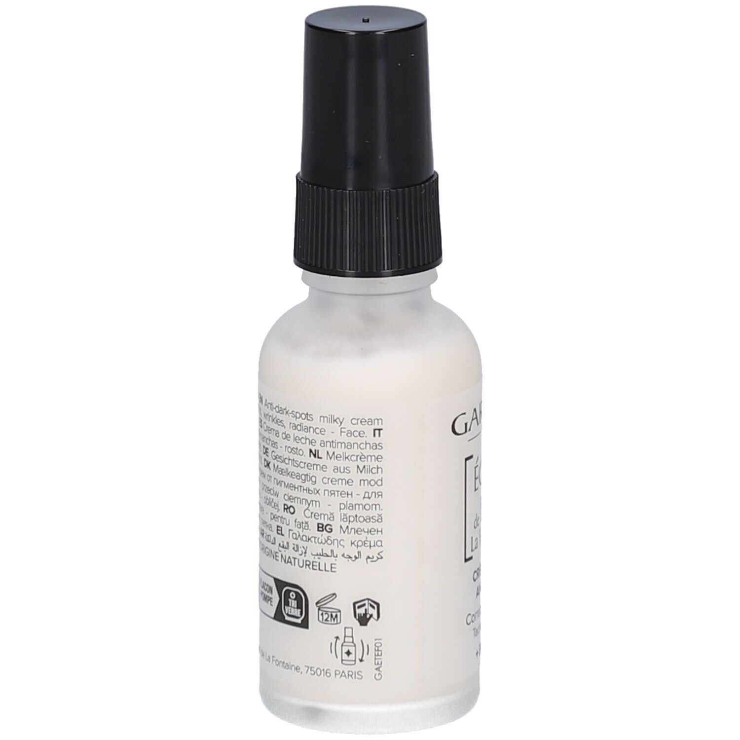 Flasche mit Milchcreme und schwarzem Sprühkopf. Rückseite mit Text in verschiedenen Sprachen.