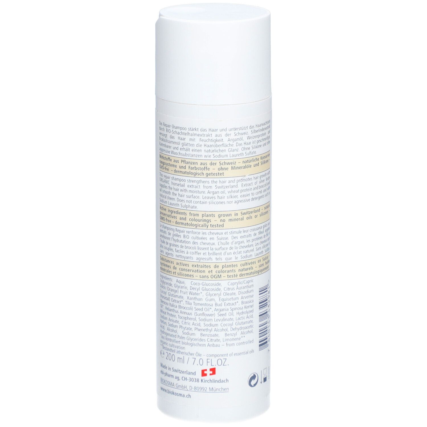 Rückseite der Shampoo-Flasche mit Text. Inhaltsstoffe, Herstellerangaben, Volumen. Vegan-Siegel.
