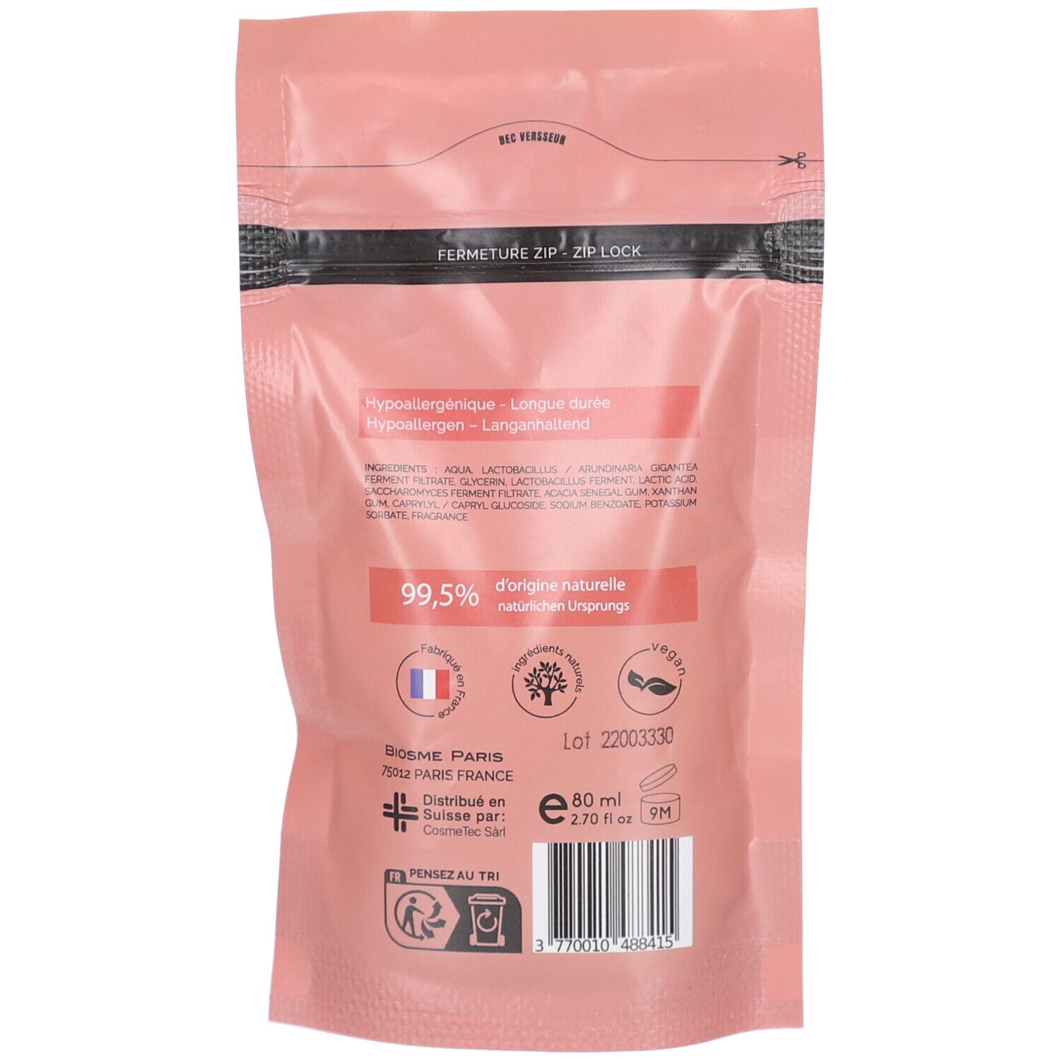 Rückseite der rosa Nachfüllpackung. Text: 99,5% natürlichen Ursprungs, vegan. Logos: Baum, Vegan-Symbol, Frankreich-Flagge.