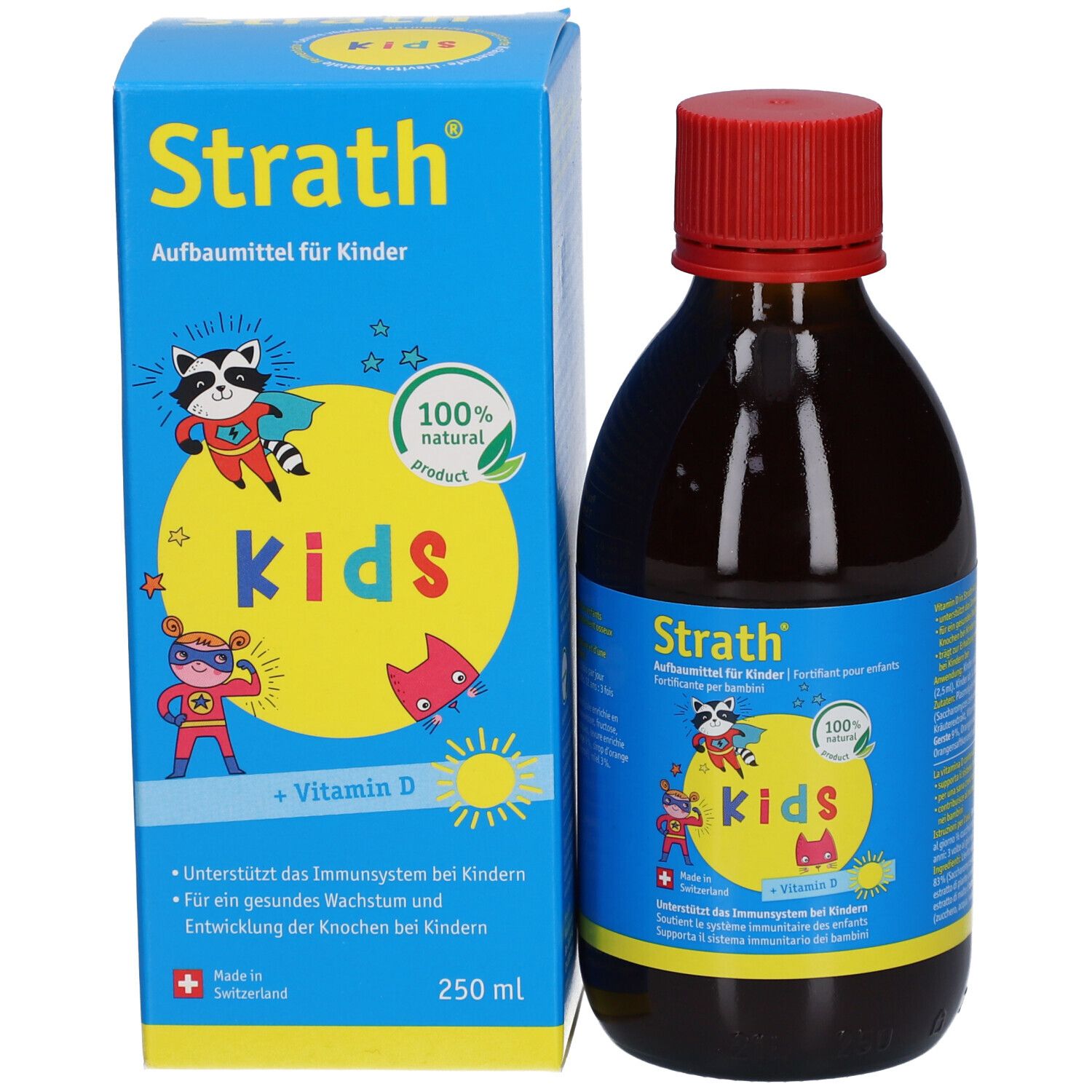 Blauer Karton mit Aufschrift Strath Kids. Enthält eine braune Flasche mit rotem Deckel. Enthält 250 ml. Enthält Vitamin D.