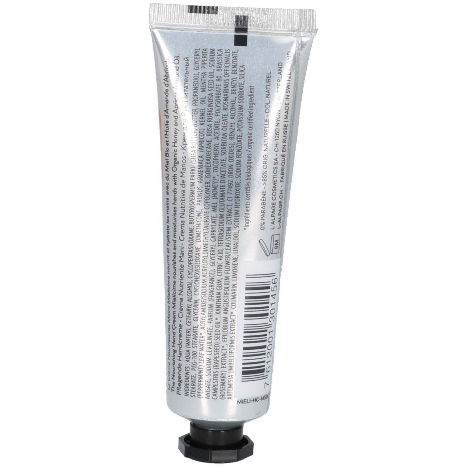 Rückseite der Handcreme-Tube. Silberfarben, mit Text und Inhaltsstoffen. Text: L'Alpage Cosmetics SA, Made in Switzerland.