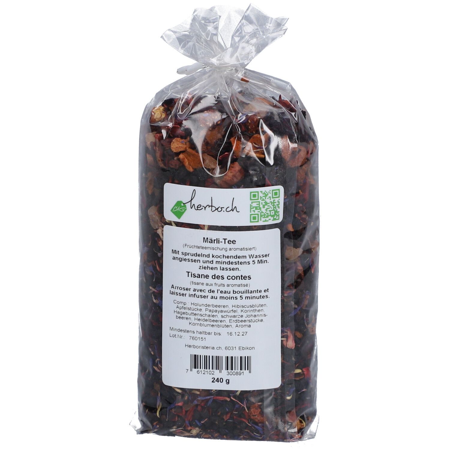 Teebeutel in transparenter Verpackung. Aufkleber mit Text und QR-Code.