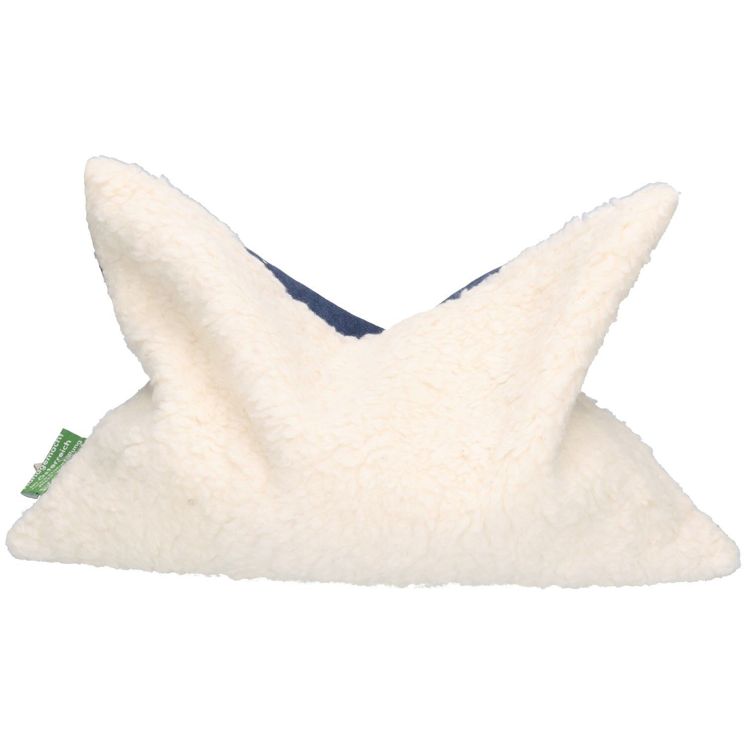 Kirschkernkissen mit flauschiger cremefarbener Teddyfleece-Außenseite und blauem Stoff innen. Sternenmuster sichtbar.