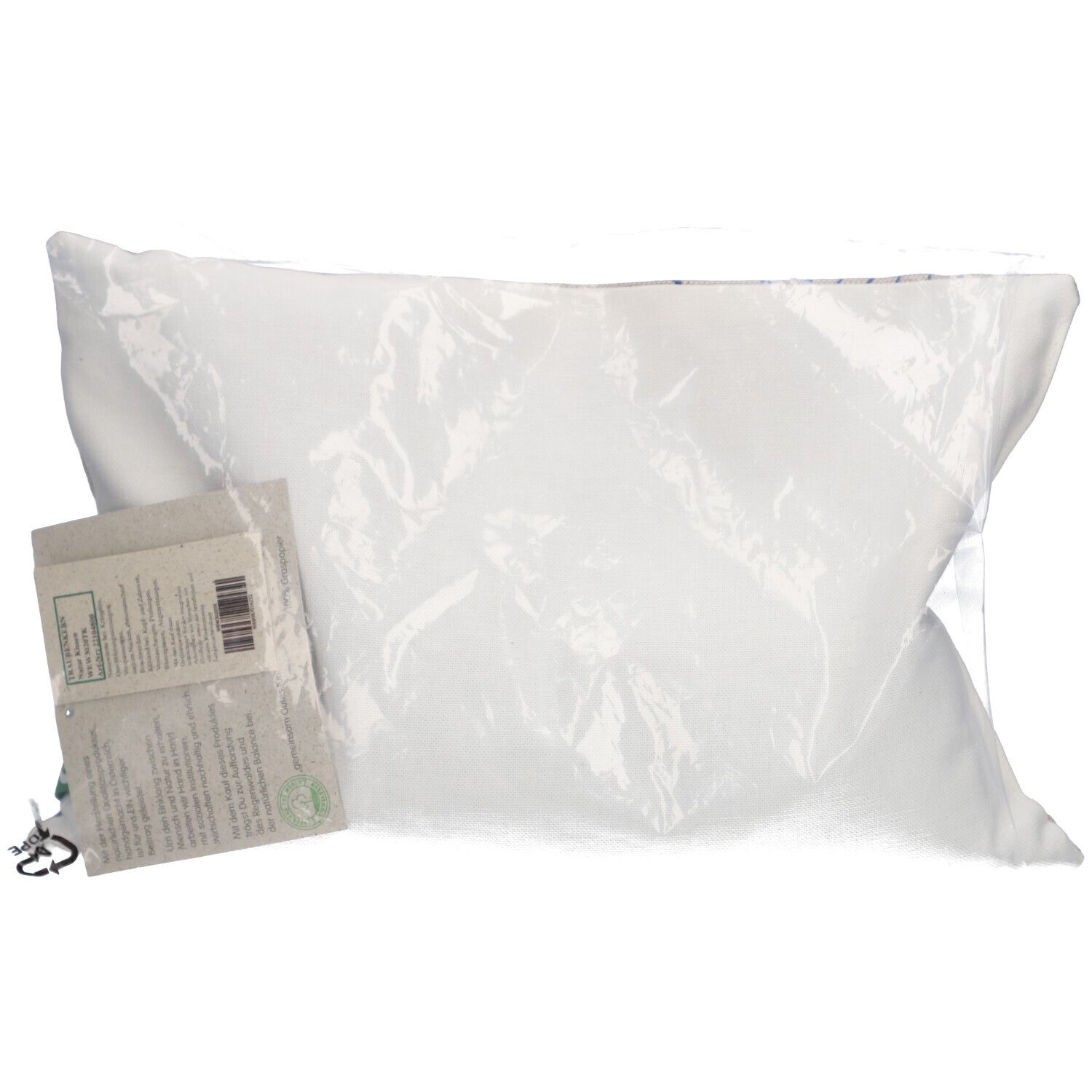 Weißes Kissen in transparenter Verpackung mit Etikett.