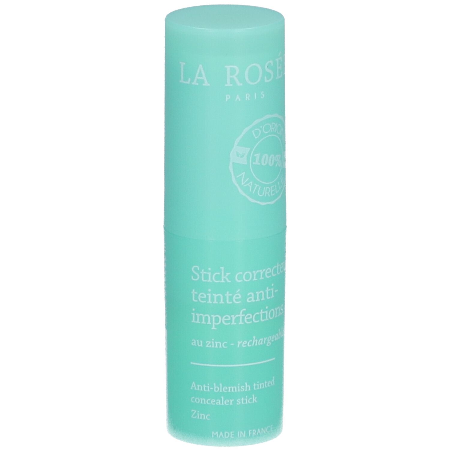 Bâton turquoise avec texte blanc. Inscription: La Rosée, Stick correcteur teinté anti-imperfections, au zinc.