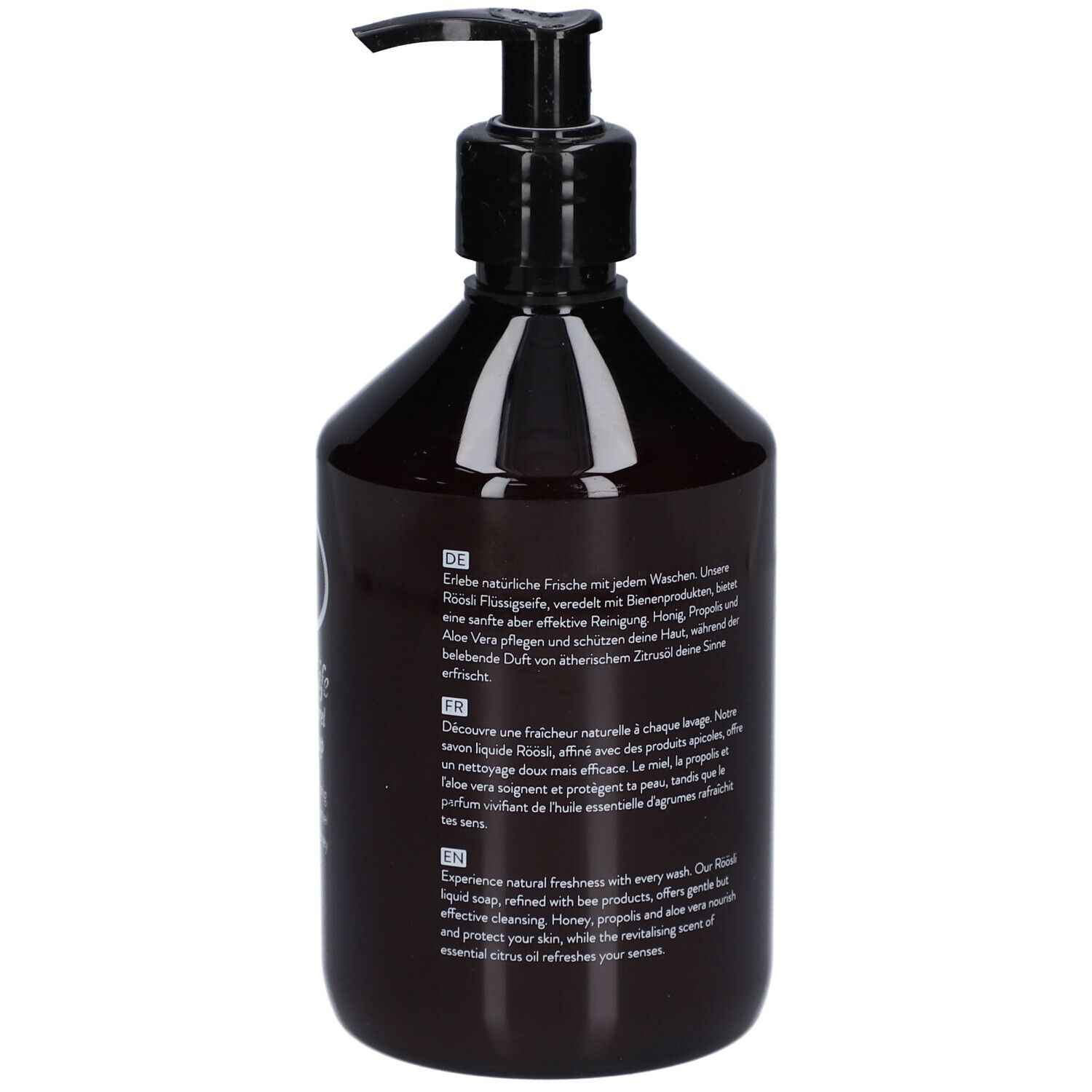 Dos du flacon brun avec pompe noire. Texte en allemand, français et anglais. Description du produit et ingrédients.