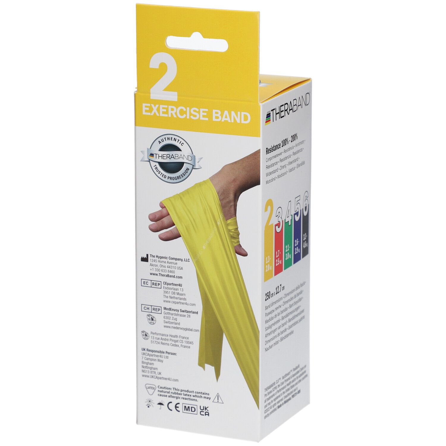 Verpackung mit gelbem Übungsband. Aufdruck: THERABAND, Exercise Band. Frau demonstriert Anwendung. Gelbes Band um Hand.