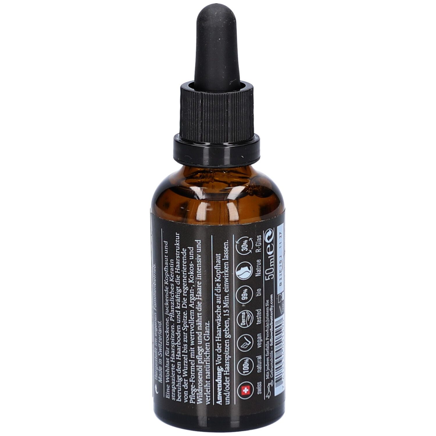 Braune Glasflasche mit schwarzem Deckel und Pipette. Seite mit Text, darunter Anweisungen zur Anwendung und Angaben zur Zertifizierung.
