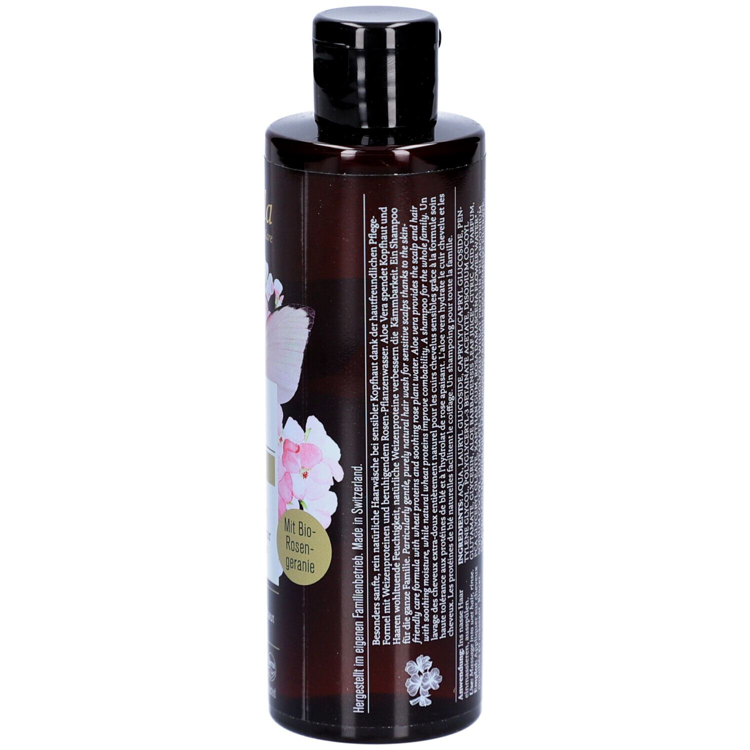 Rückseite der braunen Farfalla Shampoo Flasche. Text: Inhaltsstoffe, Herstellerinformationen, 200ml. Logos: Vegan, Swiss, Natural, getestet.