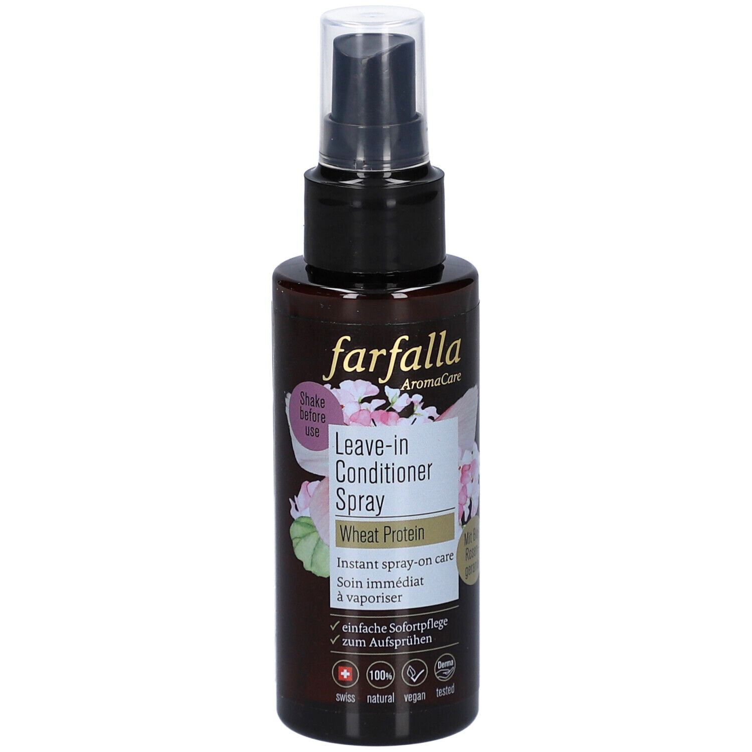 Braune Sprühflasche mit schwarzem Sprühkopf. Aufschrift: farfalla, Leave-in Conditioner Spray, Wheat Protein. Mit Blüten-Dekor.