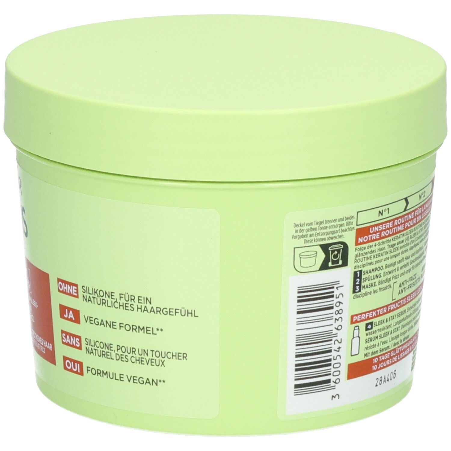 Garnier Fructis Keratin Sleek Maske: Tiegel mit Etikett, das die vegane Formel und die Abwesenheit von Silikonen hervorhebt.