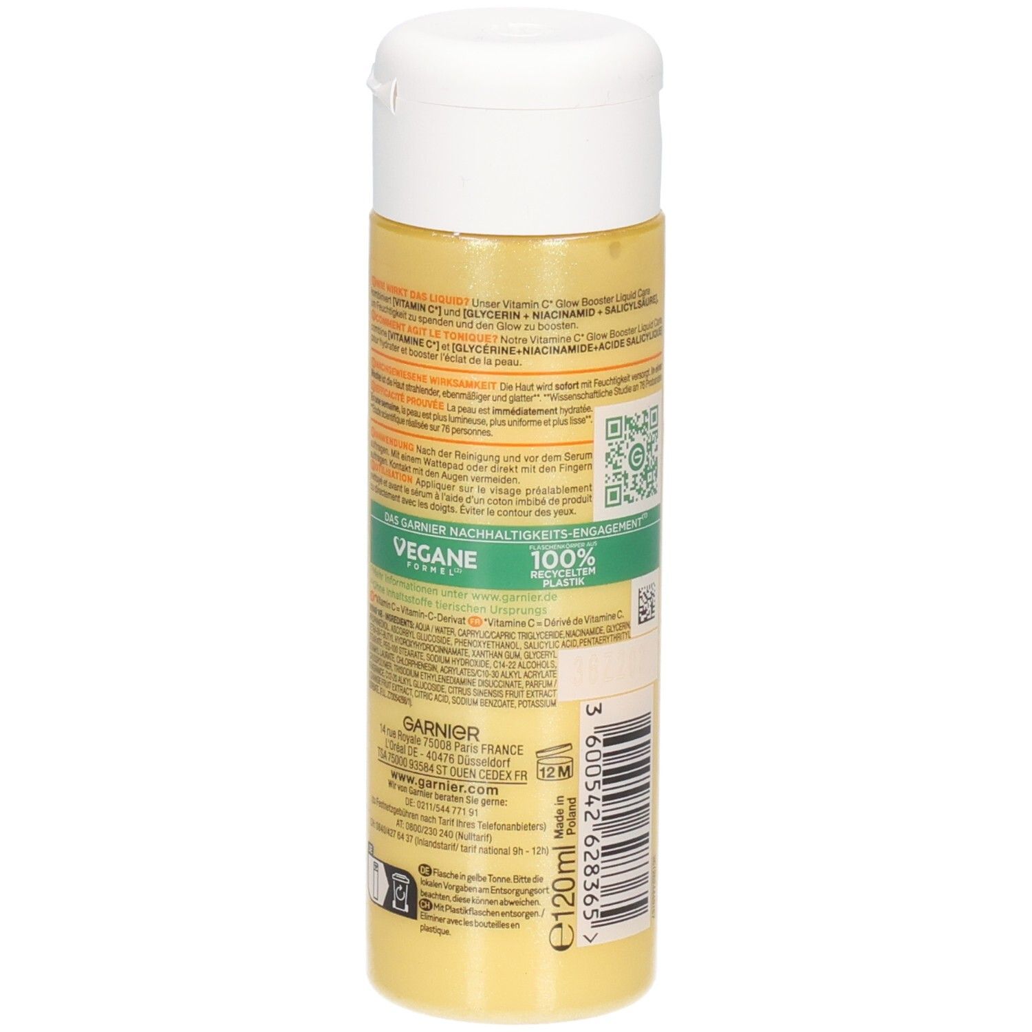 Seitenansicht der Garnier Vitamin C Glow Booster Liquid Care Flasche mit Etikett und veganem Siegel.