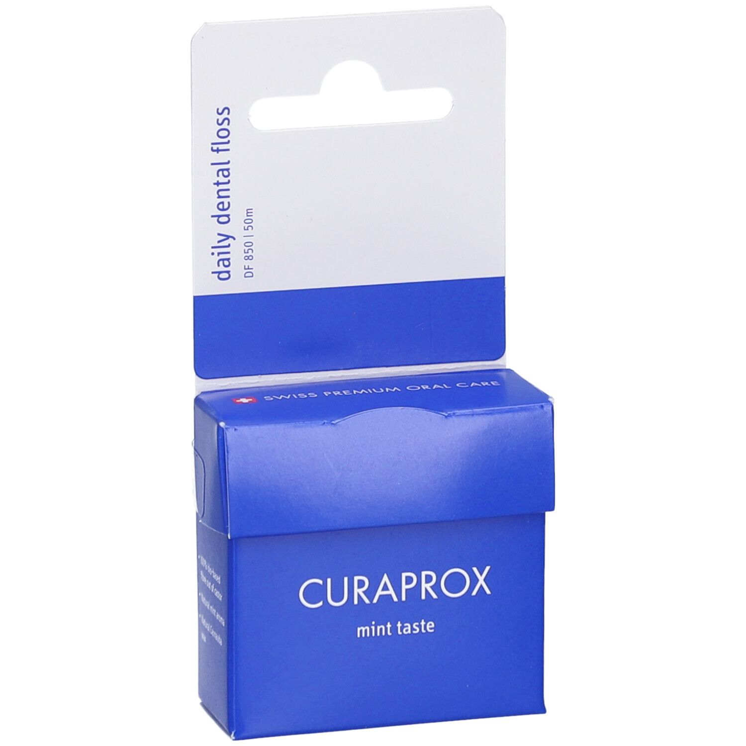 Blaue Verpackung mit weißem Aufhänger. CURAPROX-Logo und Text. Enthält Zahnseide. Aufdruck: mint taste.