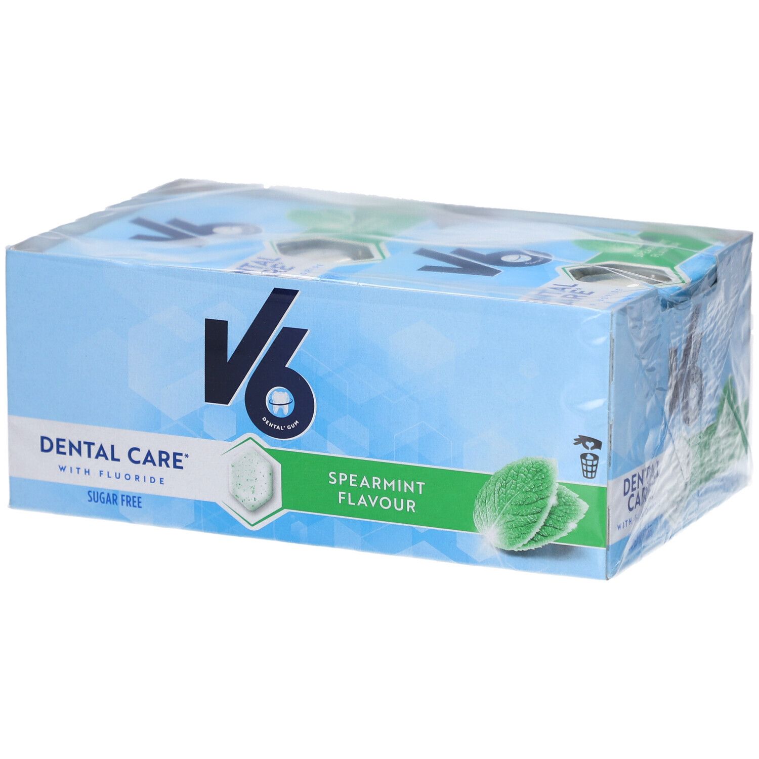 Verpackung mit V6 Kaugummi. Aufschrift: Dental Care, Spearmint Flavour, Sugar Free. Mint-Blätter und hexagonale Form.