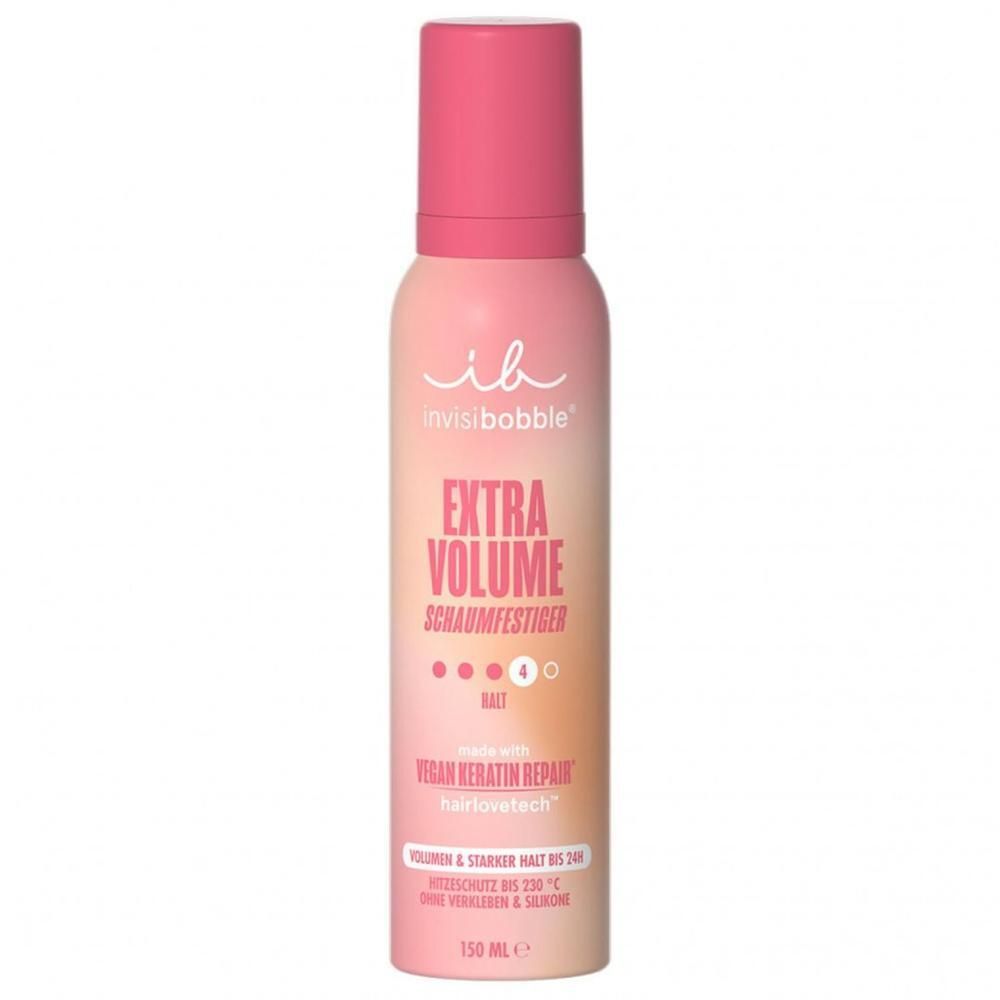 Rosa Sprühflasche mit pinkfarbenem Deckel. Aufschrift: Extra Volume Schaumfestiger. Marke: invisibobble.