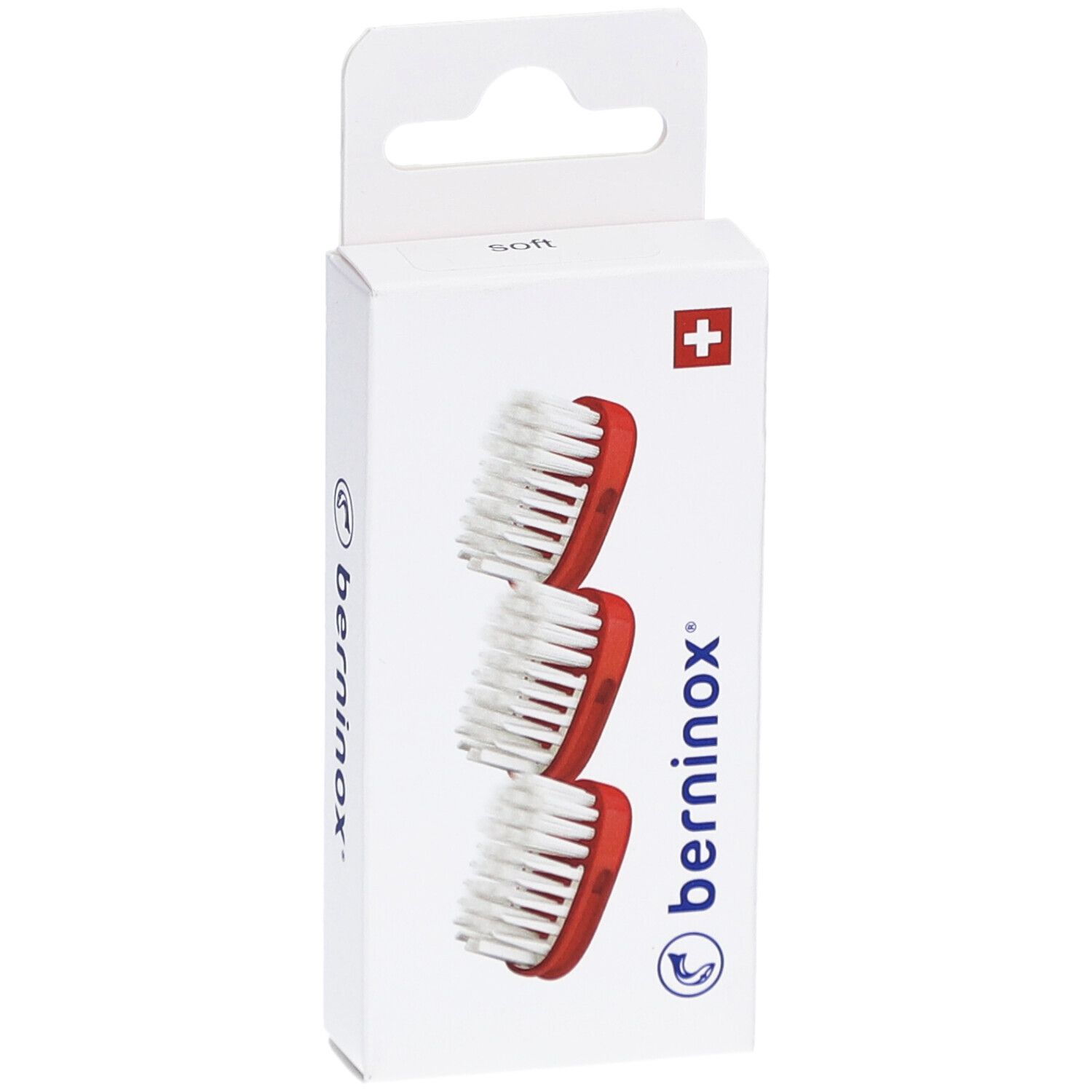 Verpackung mit drei Ersatz-Bürstenköpfen. Rote Halterung, weiße Borsten. Schweizer Kreuz und Logo 'berninox'.