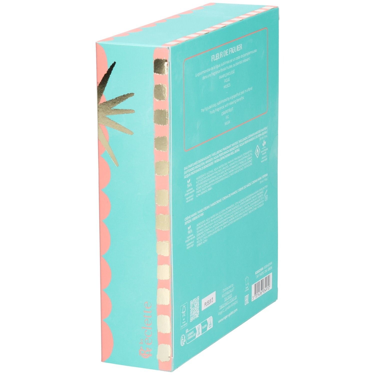 Geschenkbox, schräge Ansicht. Türkis mit Text. Text: Fleur de Figuier, Logos. Goldene Sterne und rosa Wellen.