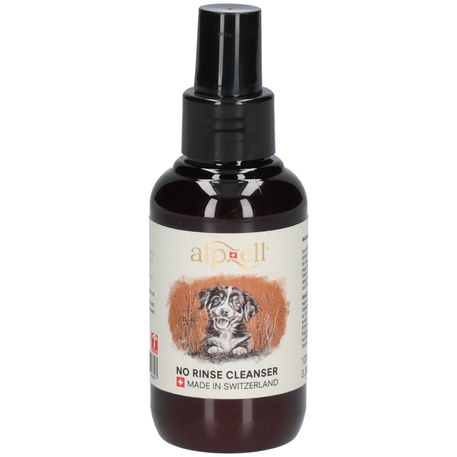 Braune Flasche mit schwarzem Sprühkopf. Etikett mit Logo, Hund und Schriftzug "NO RINSE CLEANSER". Hergestellt in der Schweiz.