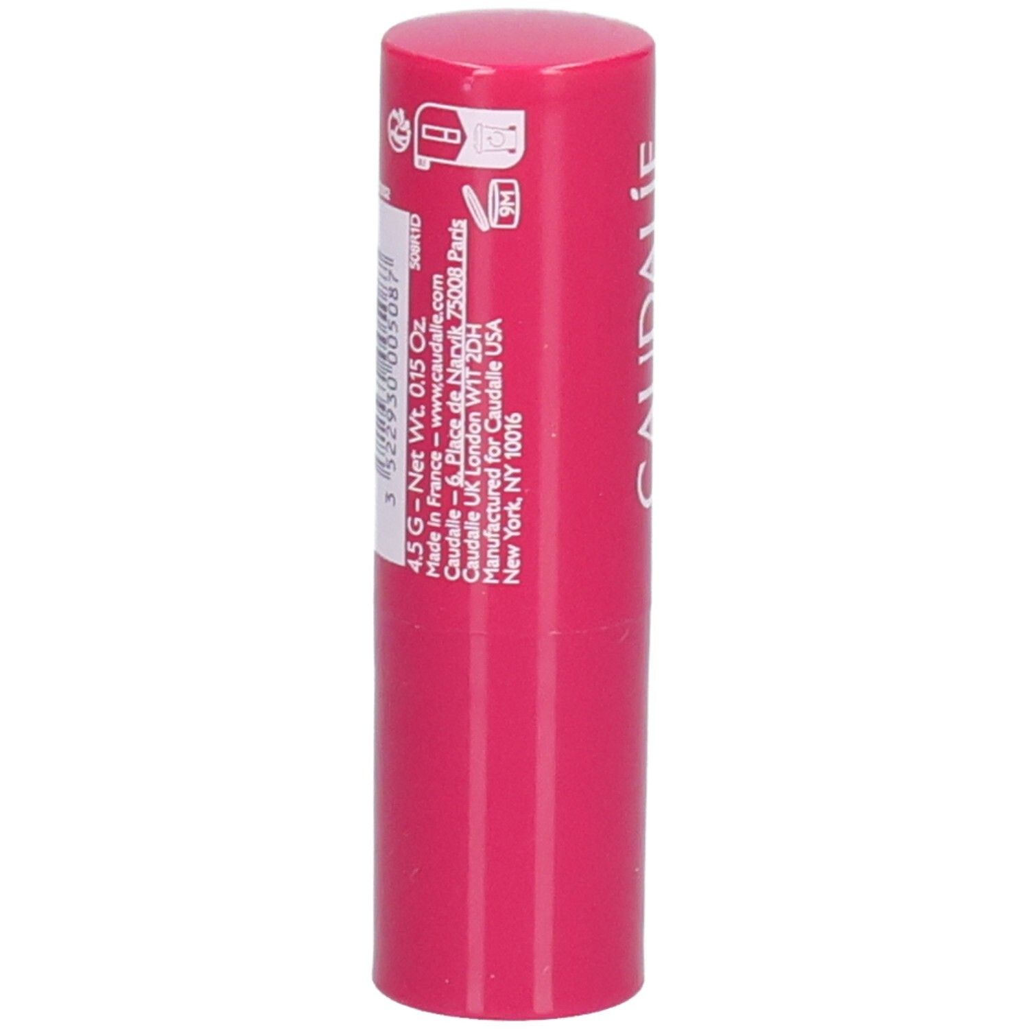 Bâton de baume à lèvres rose. Dos avec informations et code-barres. Marque CAUDALIE.