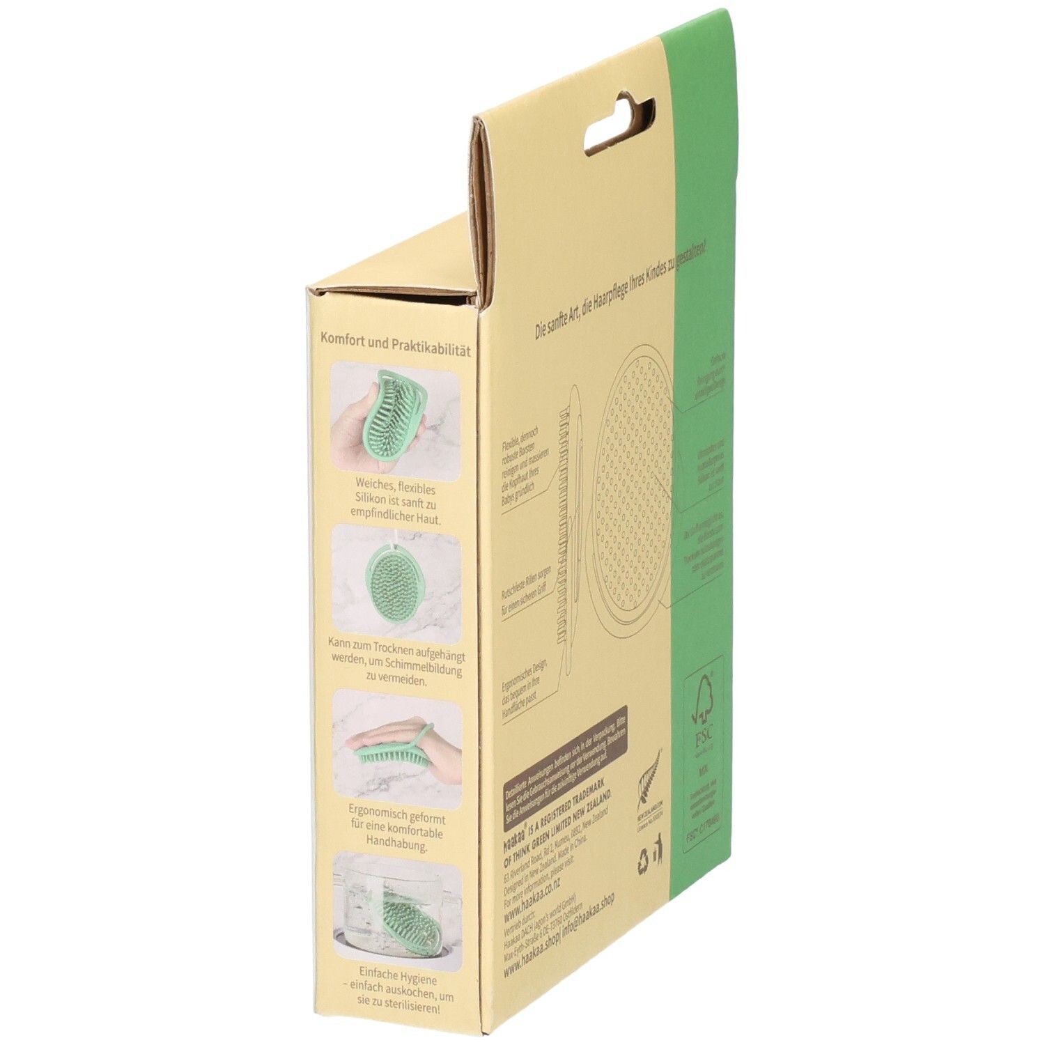 Seitenansicht der Haakaa Shampoobürste Verpackung mit Anwendungshinweisen und Produktmerkmalen.
