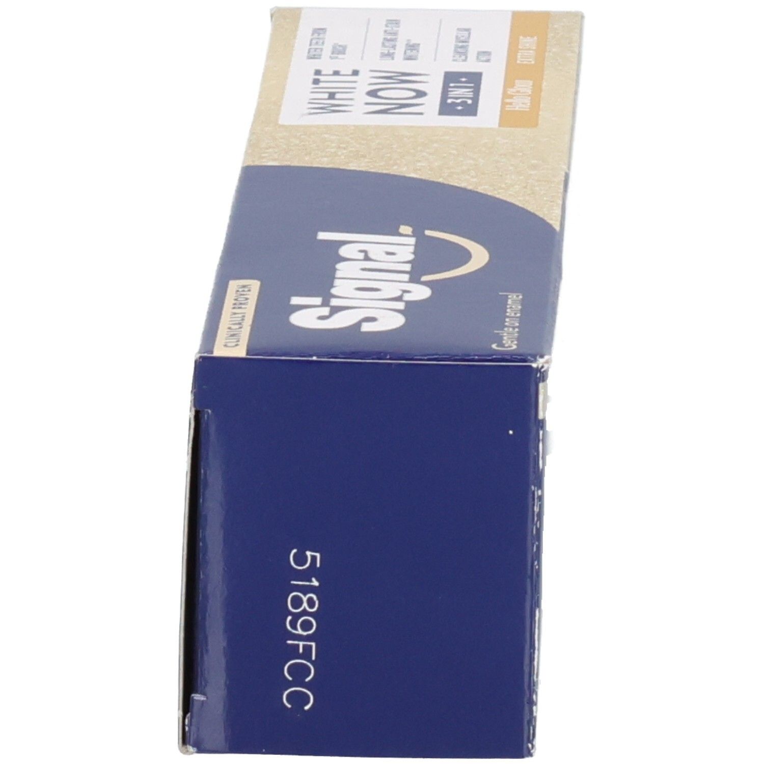 Zahncreme-Schachtel, Seitenansicht. Aufschrift: Signal. Blaue und beige Farbgebung.