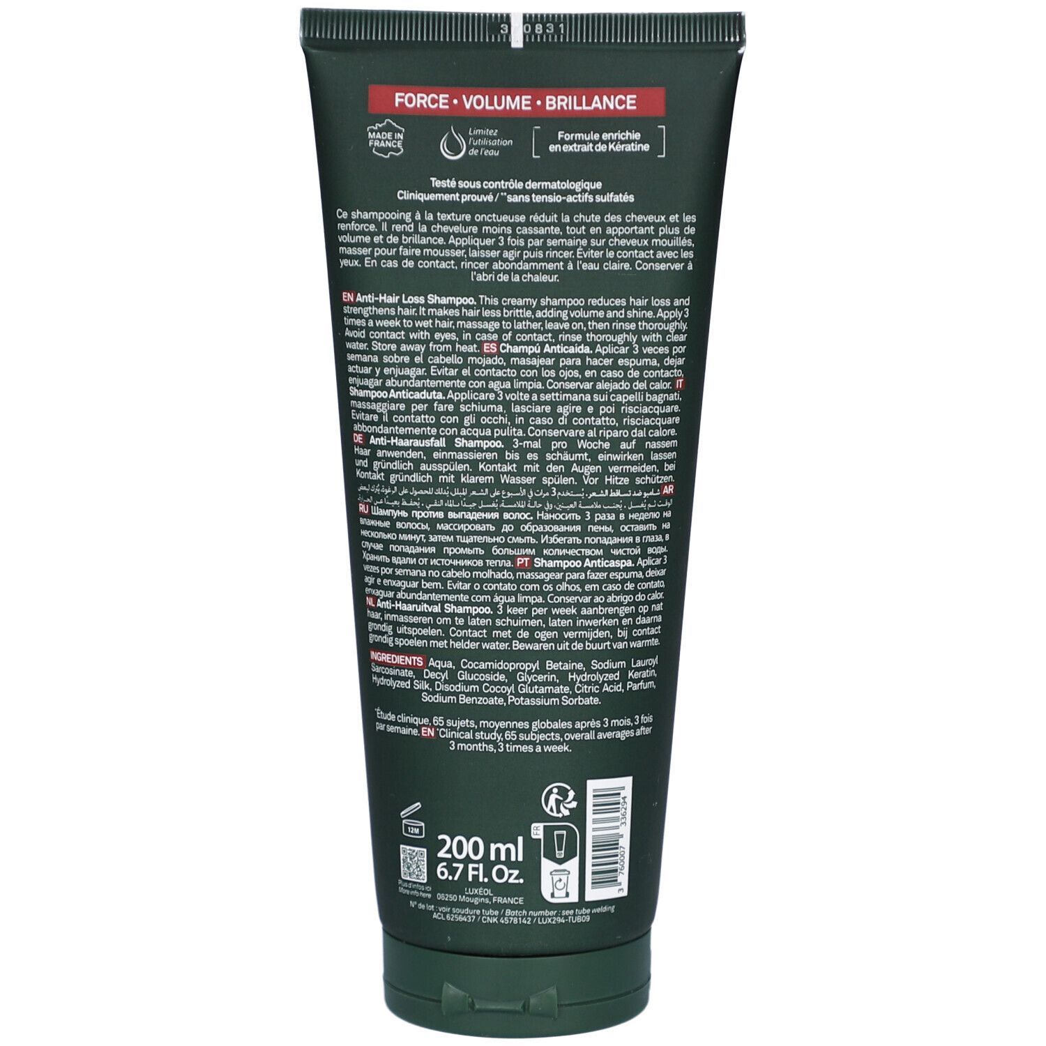 Rückseite der Shampoo-Tube. Text in mehreren Sprachen. 200 ml. 6.7 Fl.oz. Grüne Tube mit schwarzem Deckel.