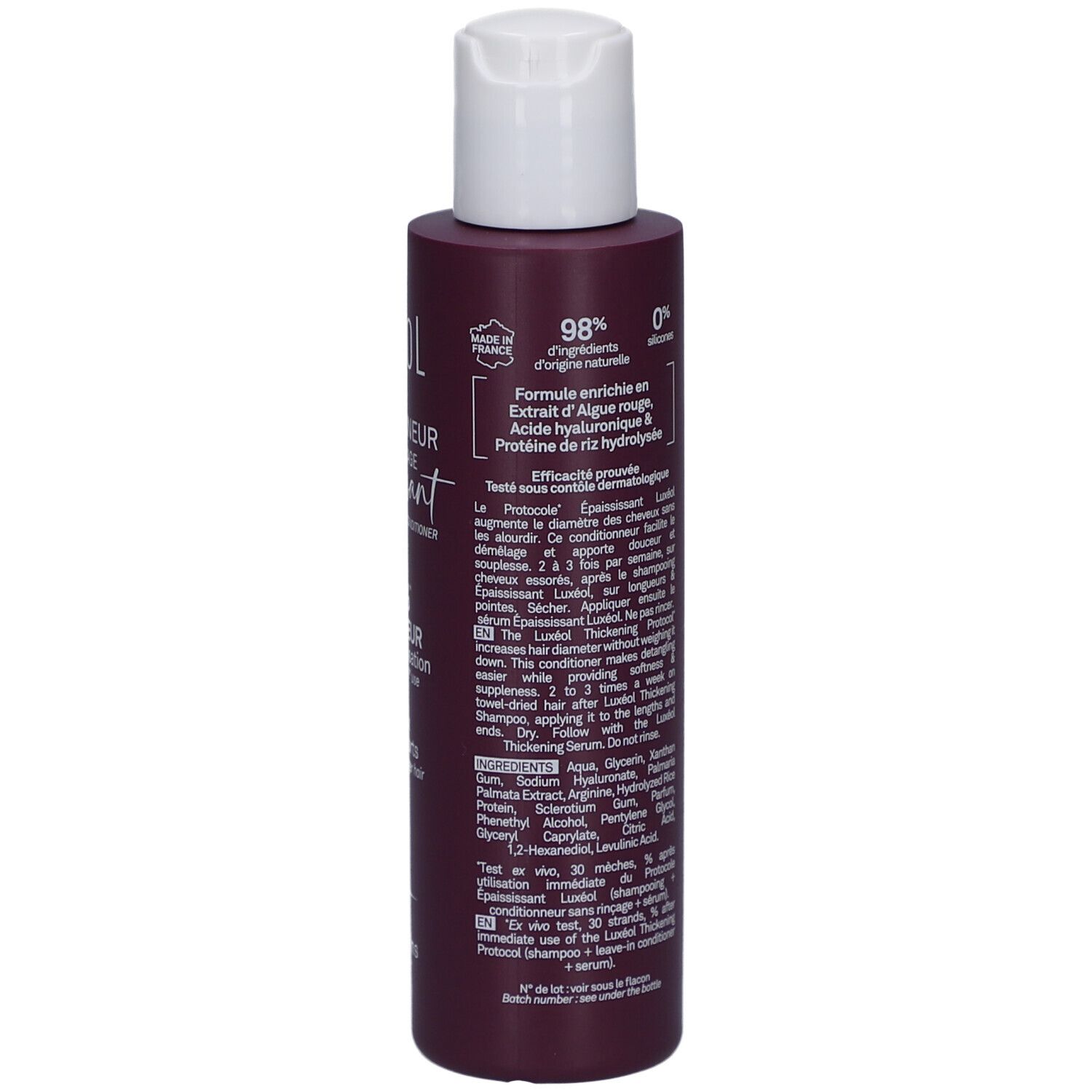 Dunkelviolette Flasche mit weißem Verschluss. Enthält Haarpflegeformel mit Algenextrakt, Hyaluronsäure und Reisprotein.