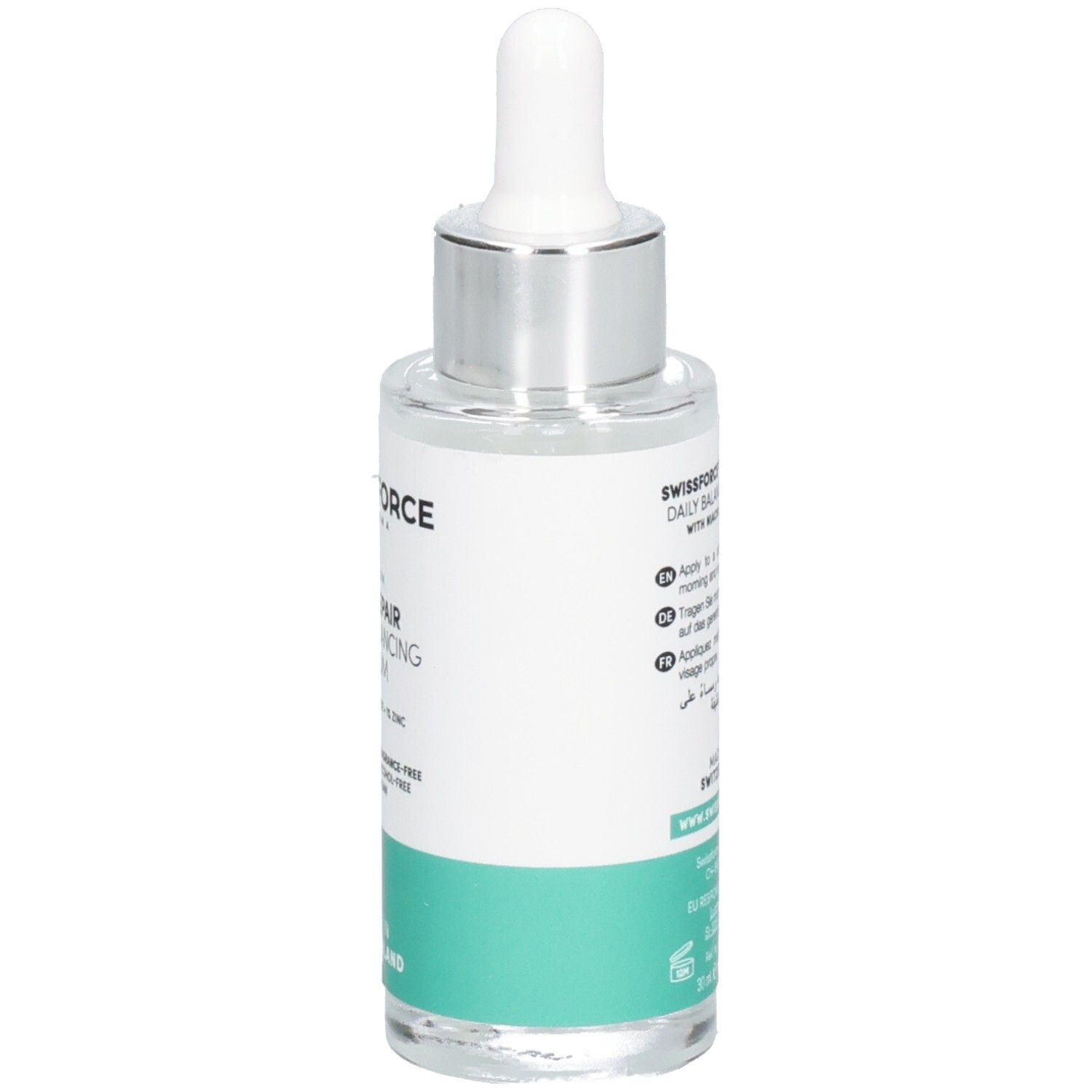 Rückansicht der Serumflasche. Aufschrift: SWISSFORCE Pharma, PRO REPAIR Daily Balancing Serum. Hergestellt in der Schweiz. Mit Anwendungsanleitung.
