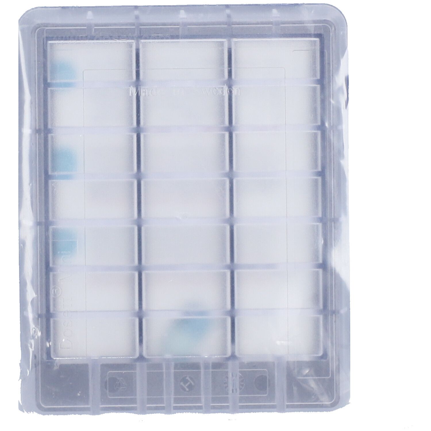Transparente Pillendose mit 21 Fächern in Plastikverpackung. Fächer für die Wochenaufteilung. CE-Kennzeichnung.