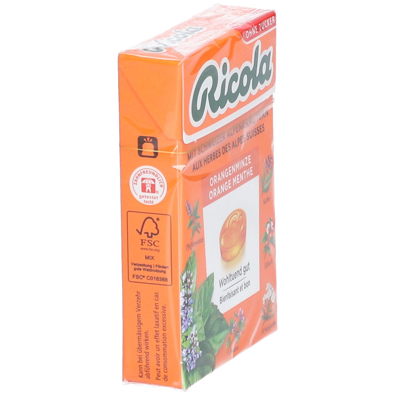 Emballage de bonbons Ricola Orange menthe, en biais. Boîte orange avec logo et texte.