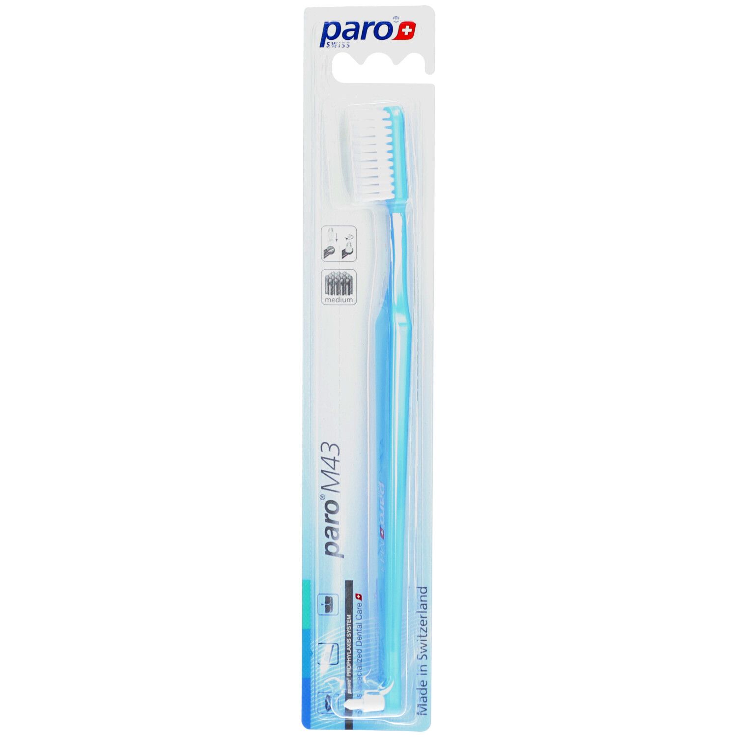 Brosse à dents bleu clair, tête blanche. Marque paro® M43. Emballage blister. Fabriqué en Suisse.
