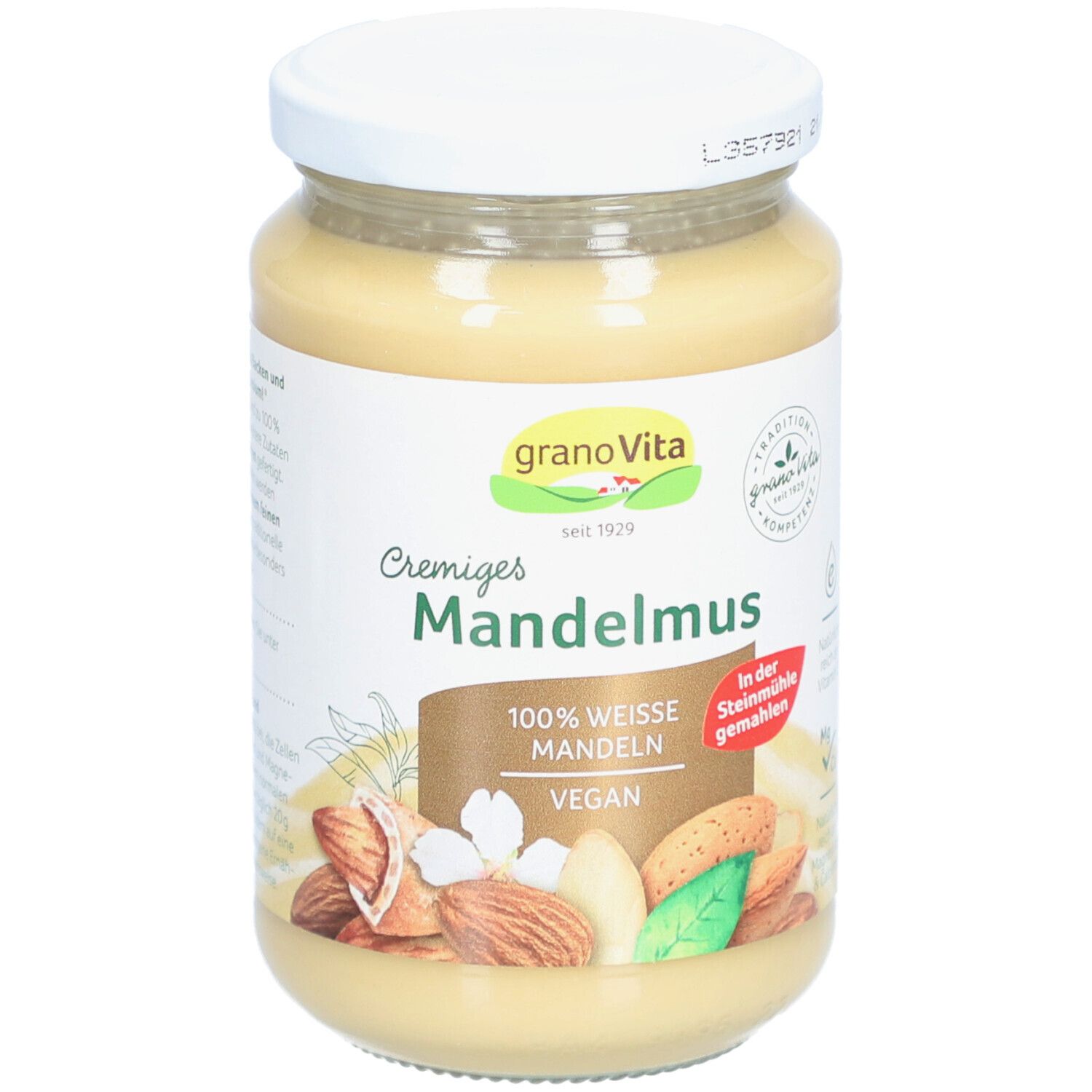 Glas mit Cremiges Mandelmousse. Aufschrift: granaVita, Mandelmuss, 100% weisse Mandeln, vegan. Abbildung von Mandeln.